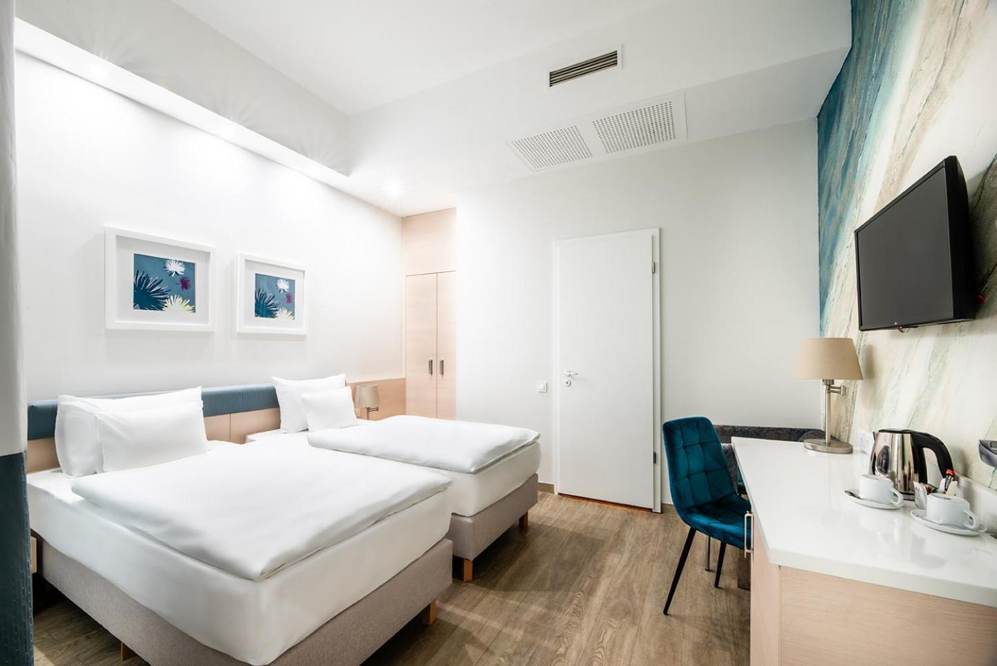 Tweepersoonskamer met 1 of 2 Bedden en Uitzicht op Atrium