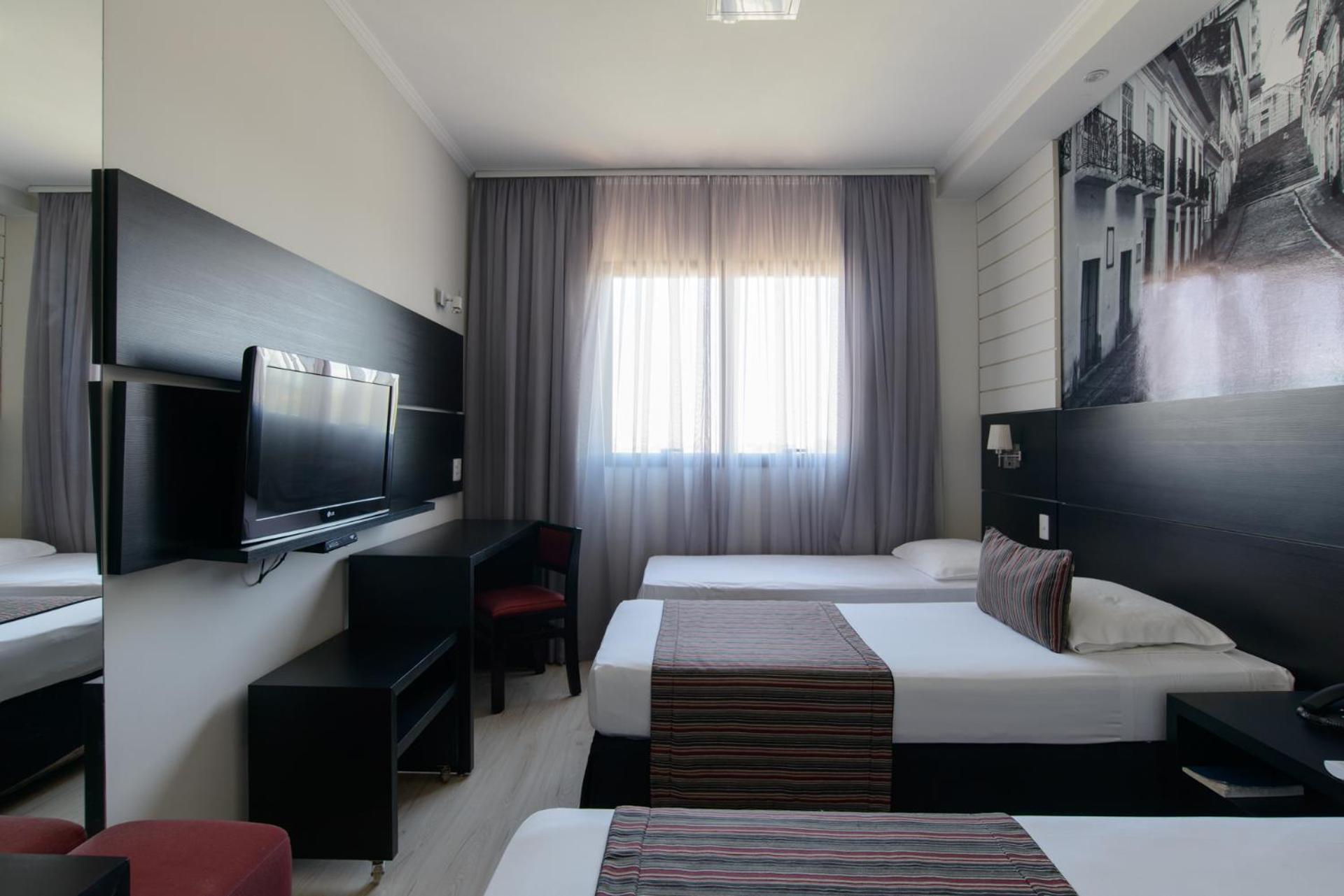 Quarto Triplo Luxo