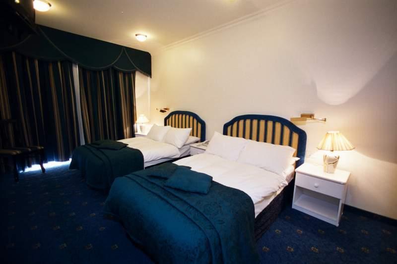 Chambre Triple avec Balcon