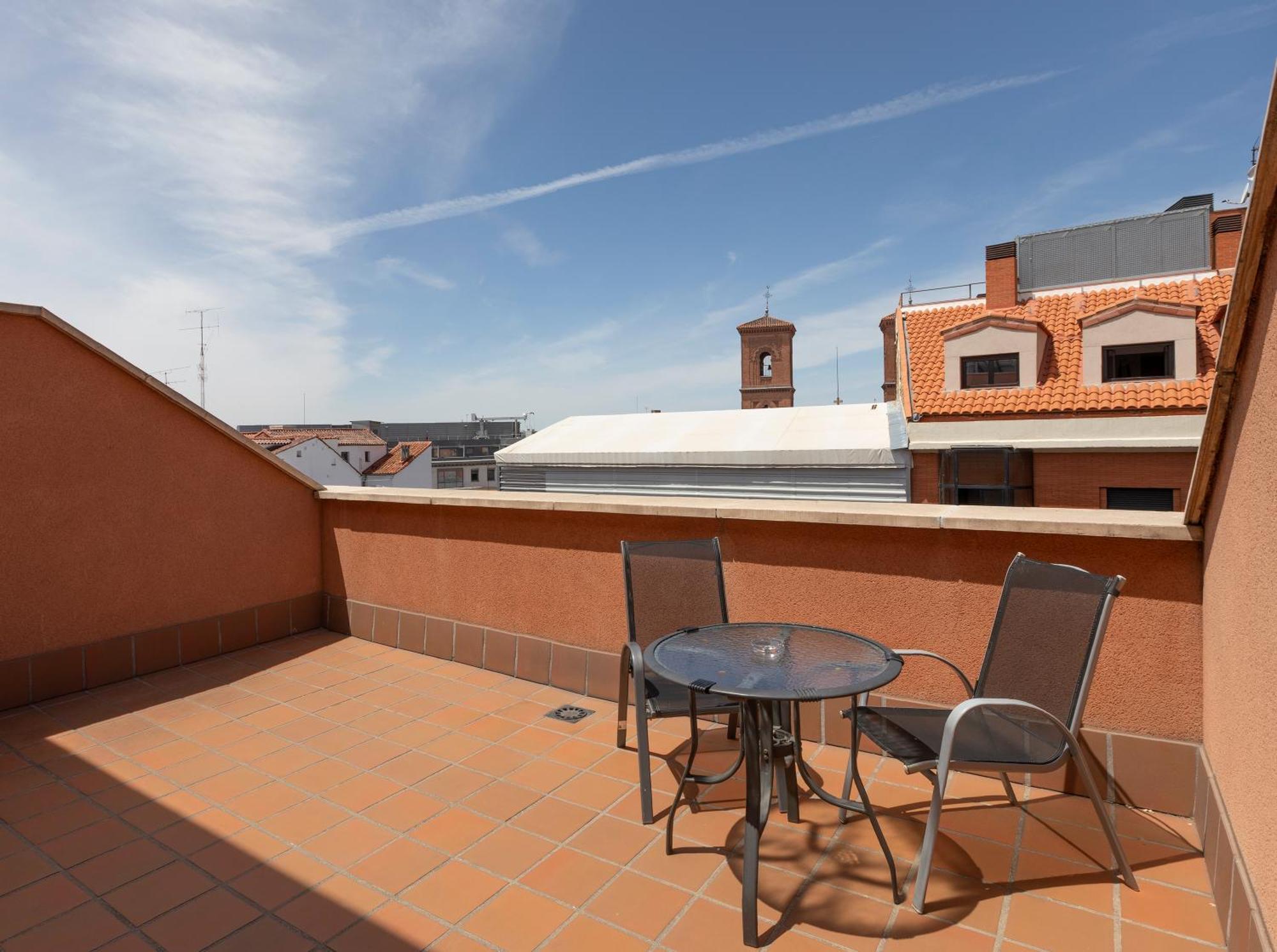 Tweepersoonskamer met 1 of 2 Bedden en een Terras