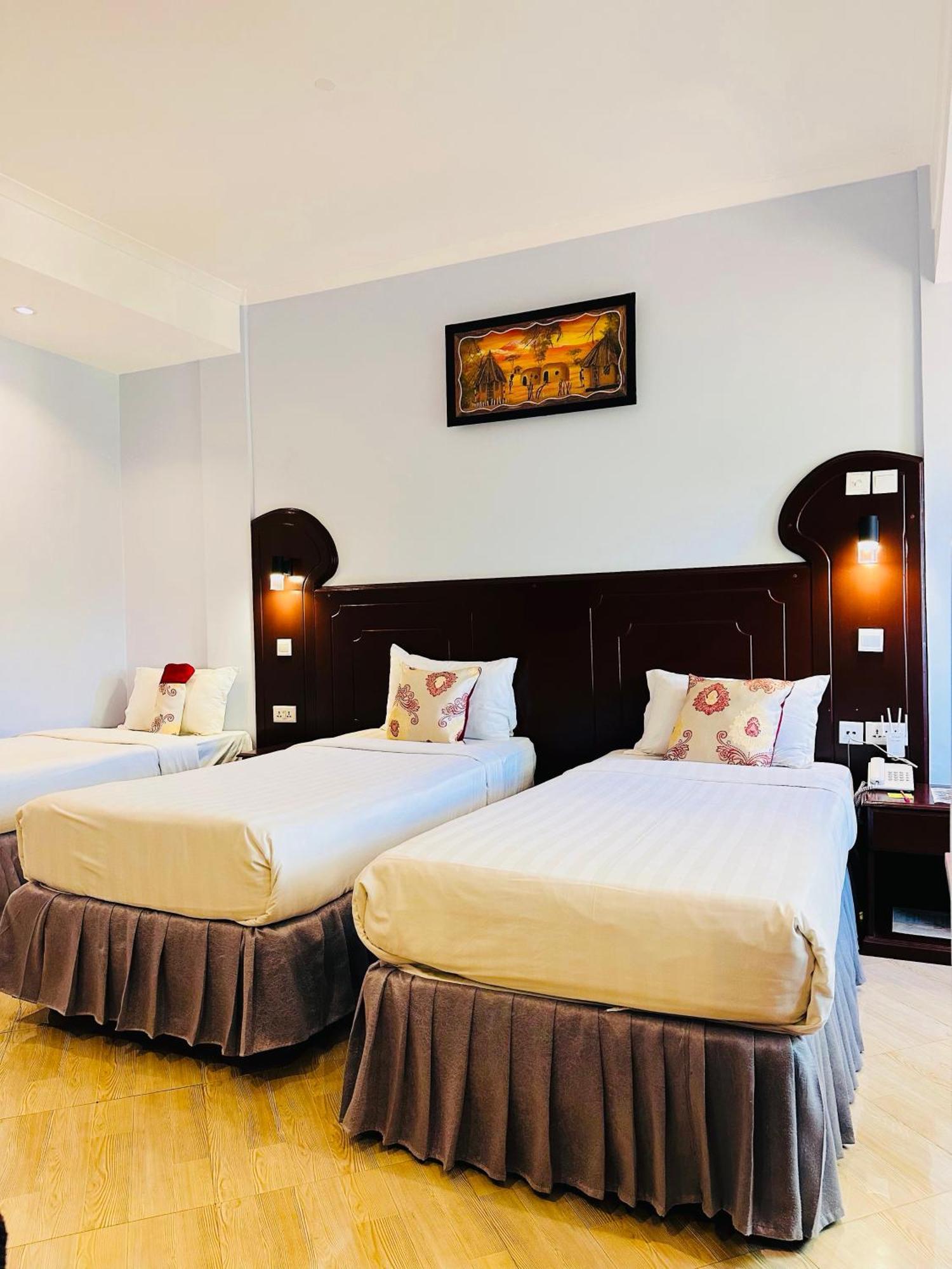 Deluxe Triple Room
