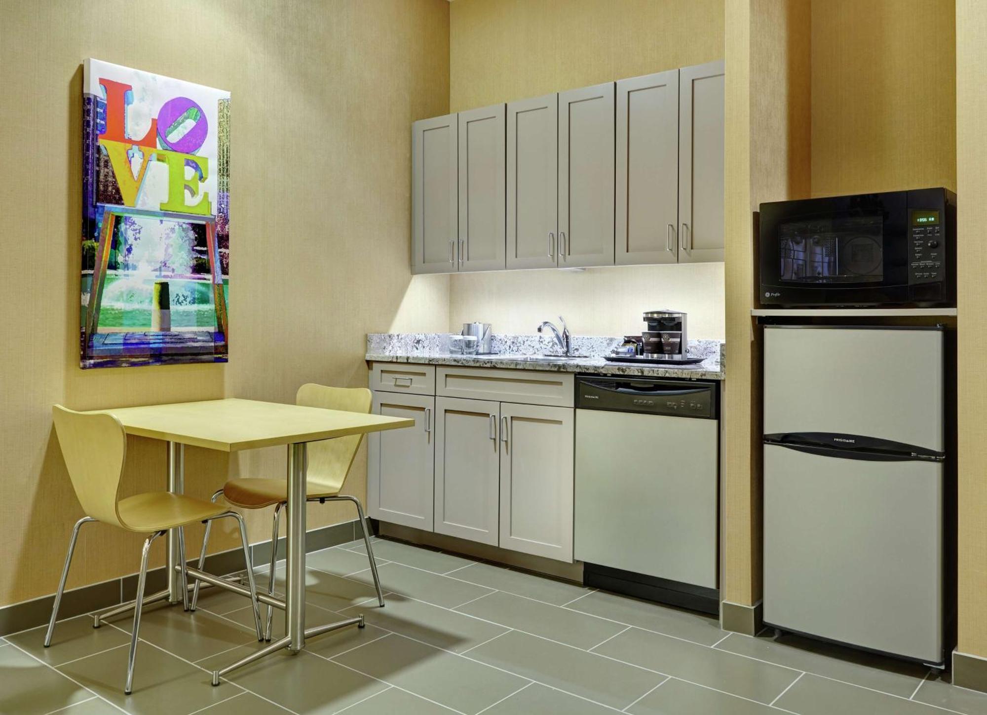 Suite met een Kingsize Bed en Kitchenette