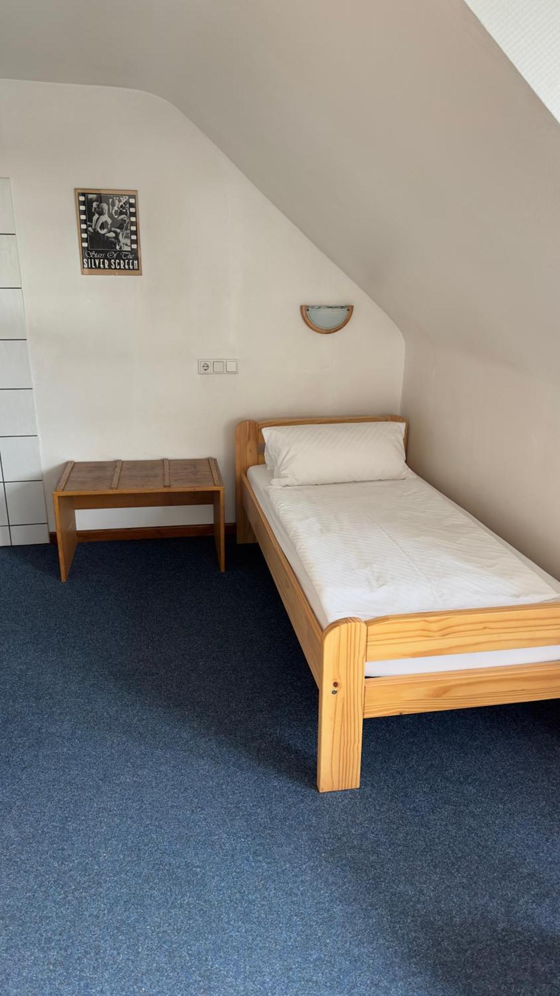 Eenpersoonskamer met Gedeelde Badkamer en Toilet