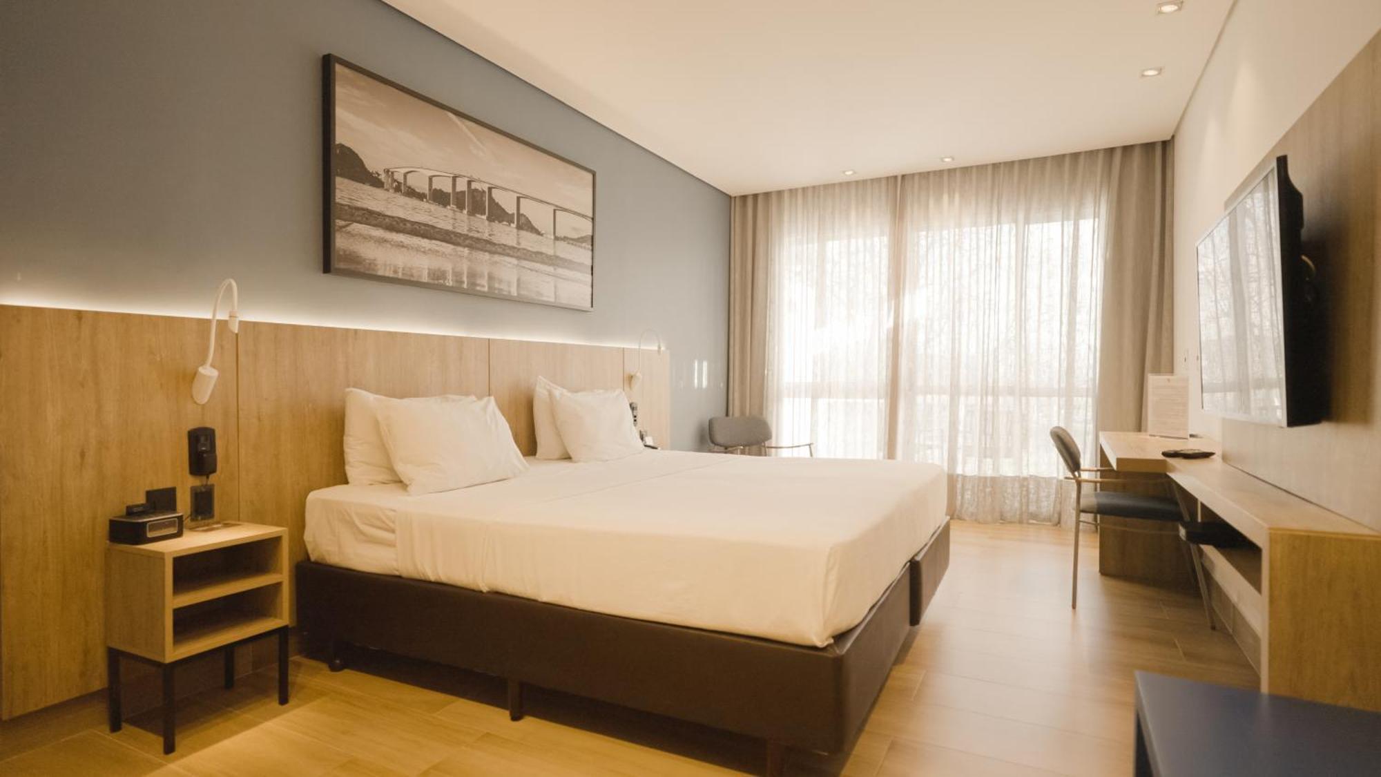 Quarto com Cama Queen-Size e Varanda