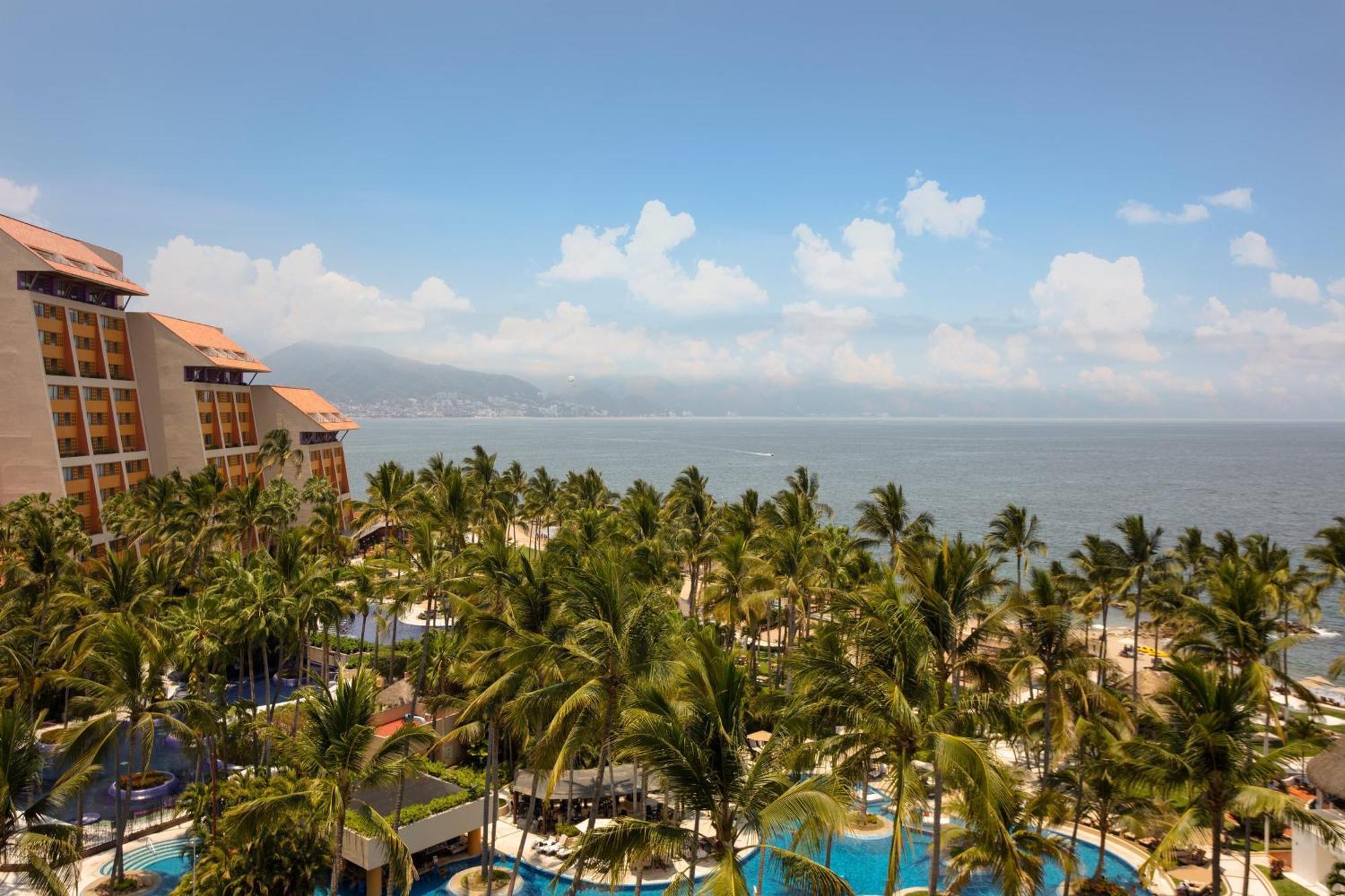 Suite Junior con 2 camas dobles y vistas al mar