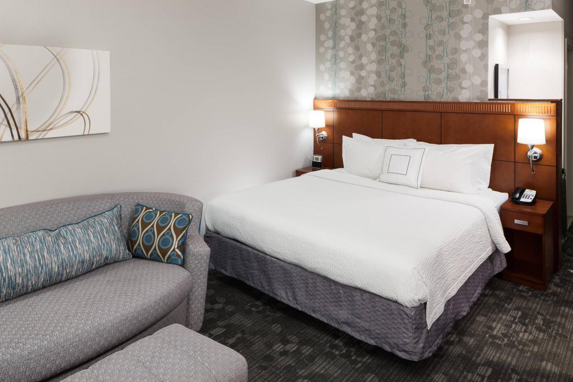 King Room with Sofa Bed and Roll-in Shower - Mobility and Hearing Accessible