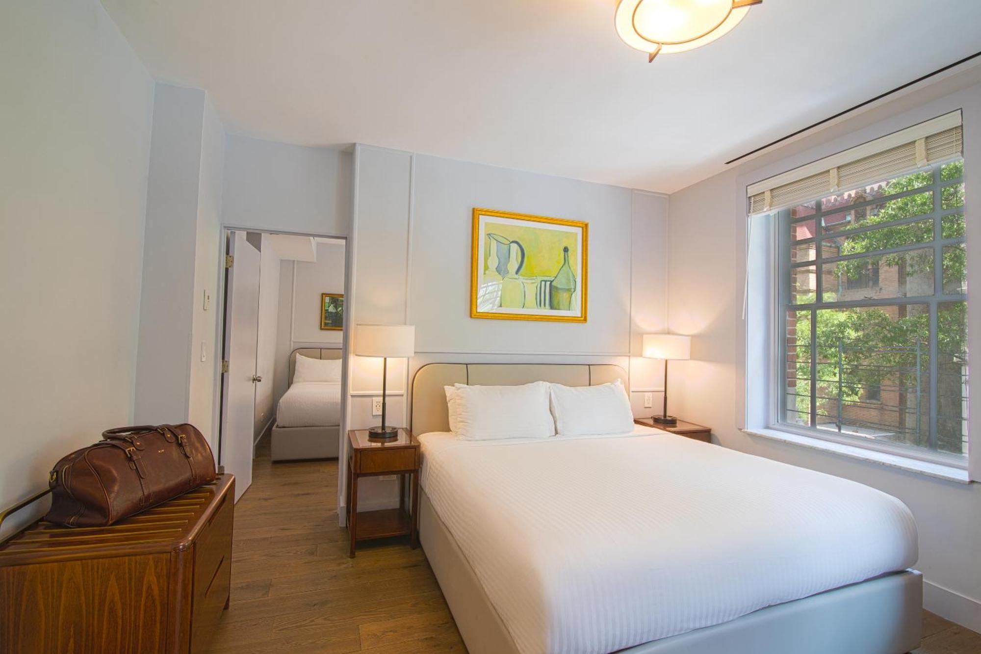 Suite Familiar - 1 cama extragrande y 2 camas dobles
