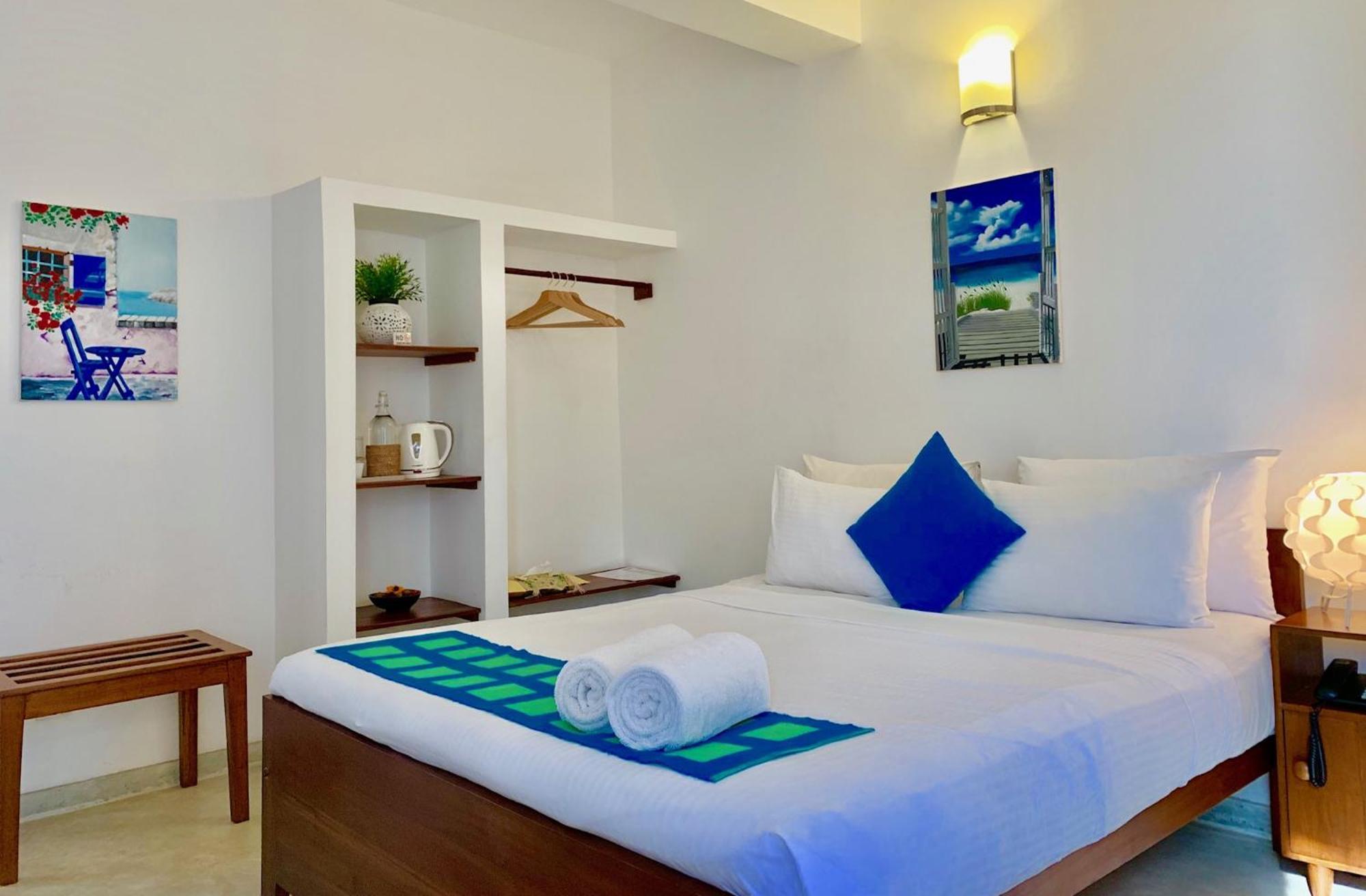 Chambre Double Deluxe - Vue Latérale sur Mer