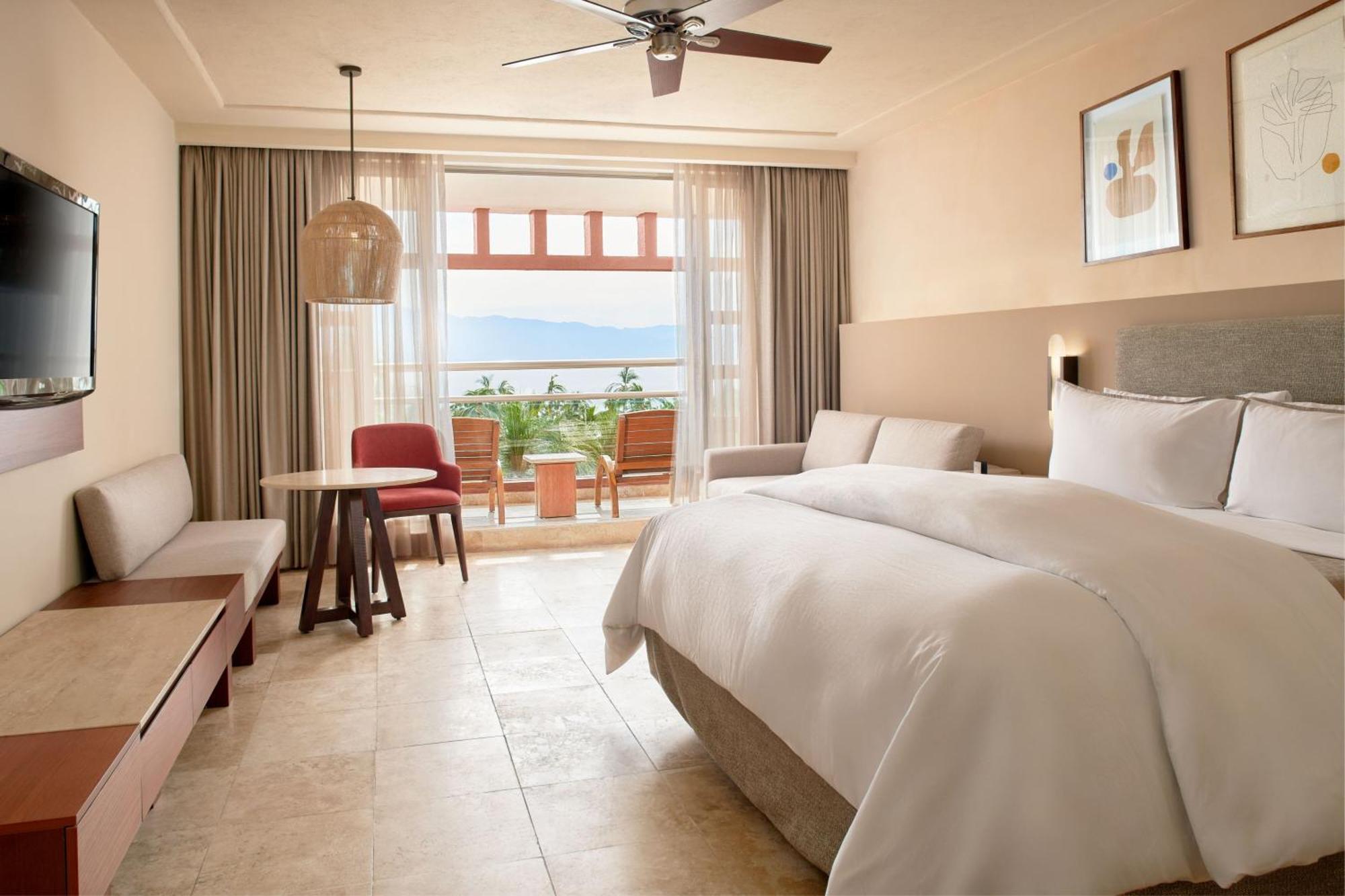 Suite Junior con vistas parciales al océano - cama extragrande