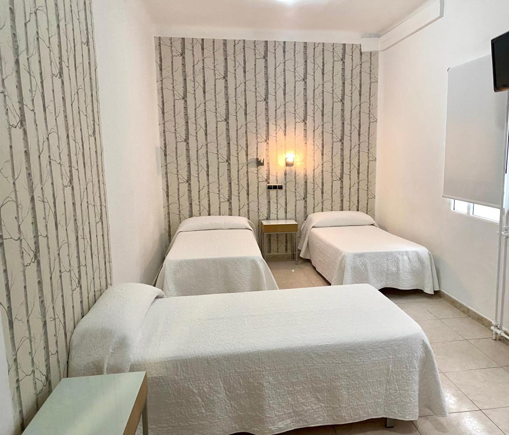 Camera Matrimoniale/Doppia con Letti Singoli con Letto Supplementare