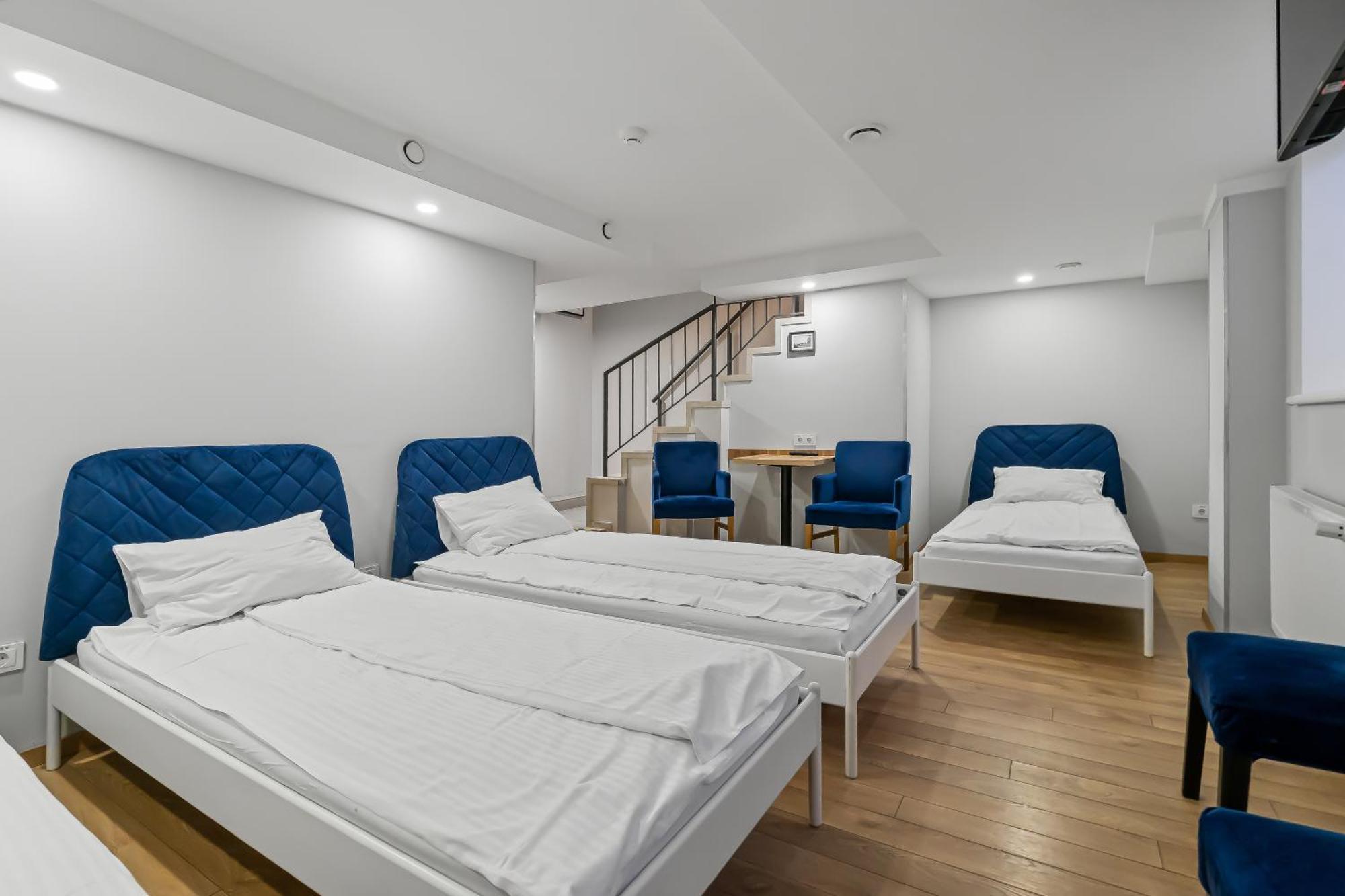 Base Floor Quadruple Room with Private Bathroom 31 sq. m.