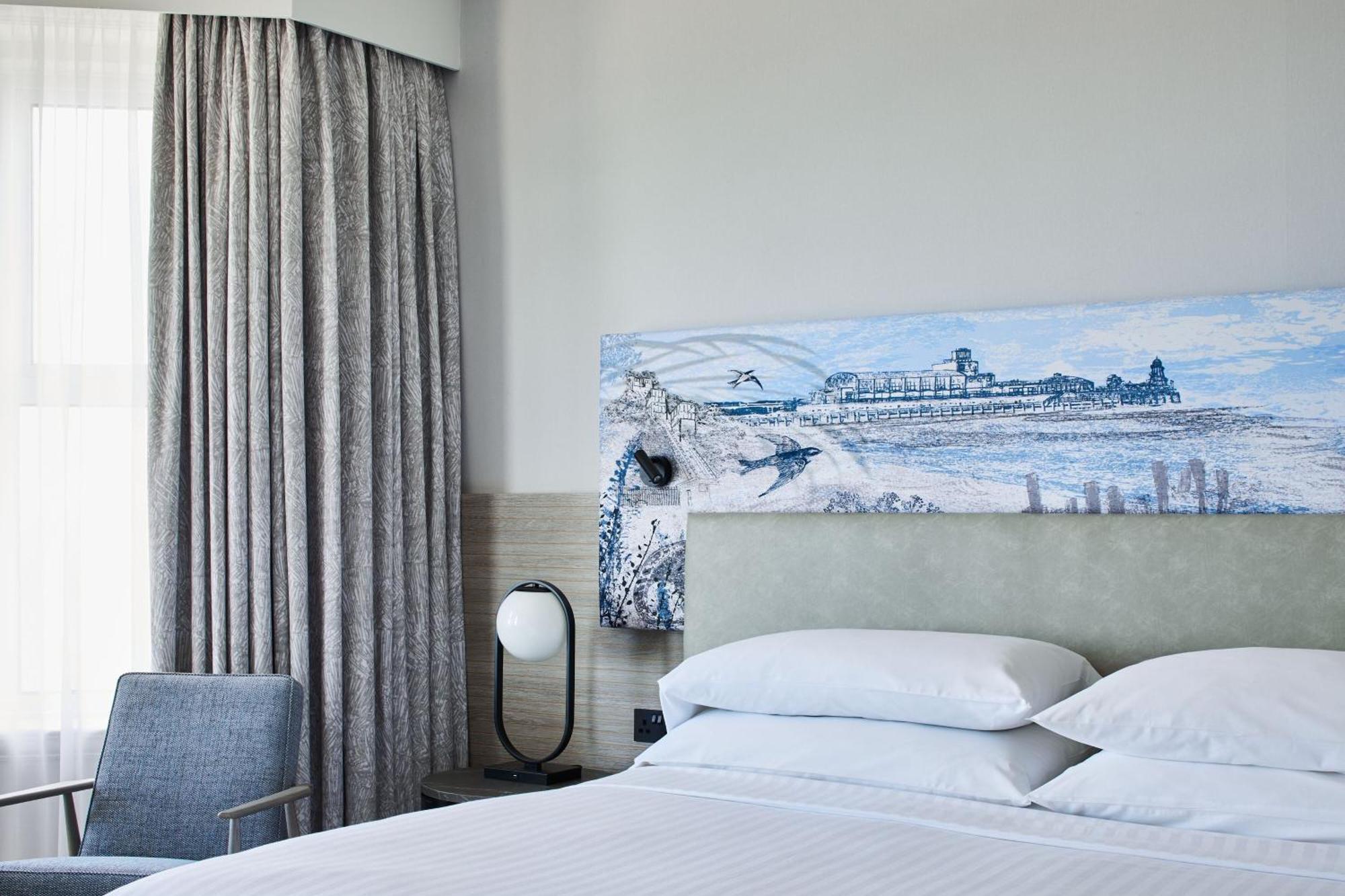 Suite mit 1 Schlafzimmer mit Kingsize-Bett, Schlafsofa und Meerblick