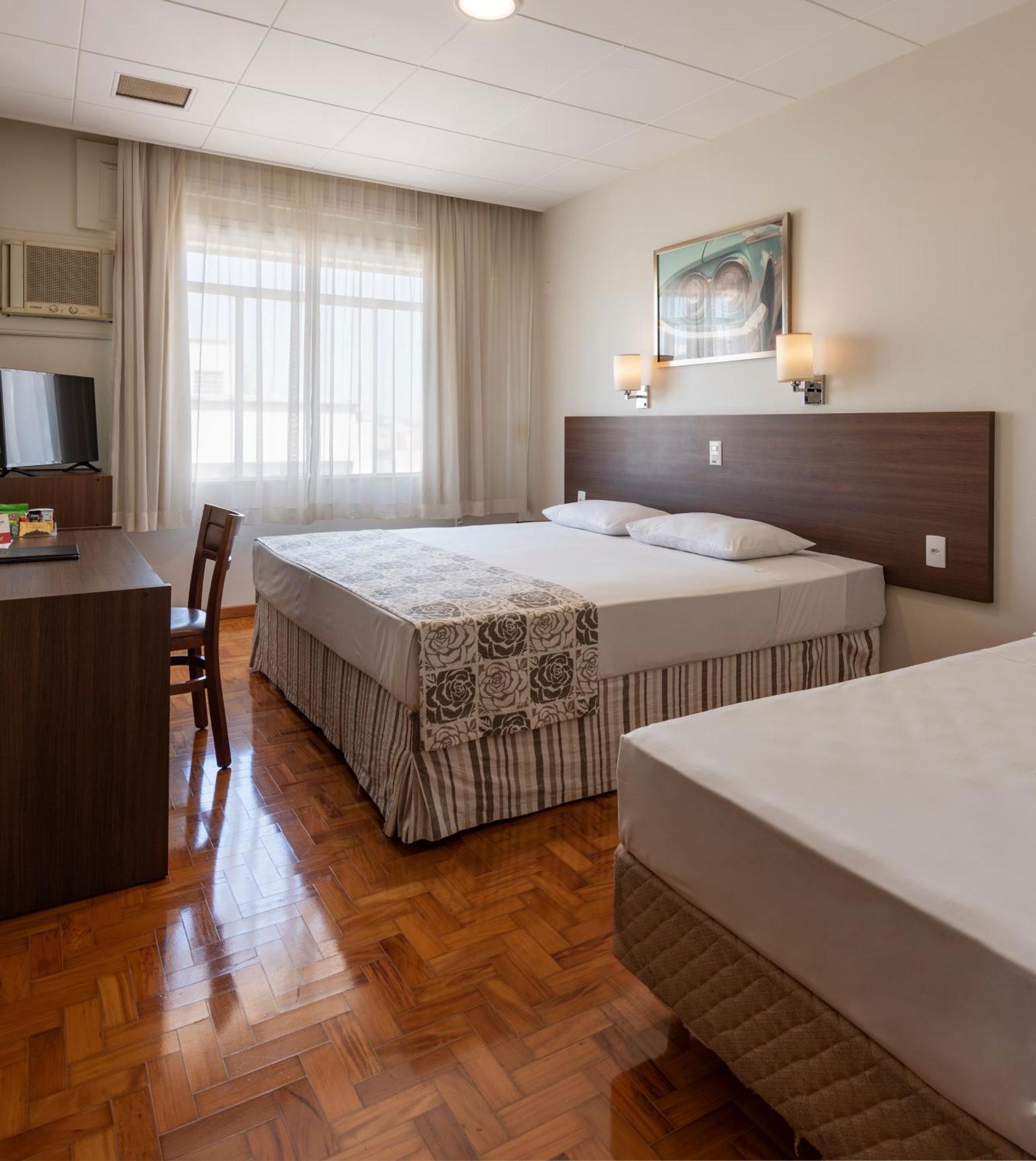 Quarto Triplo Luxo