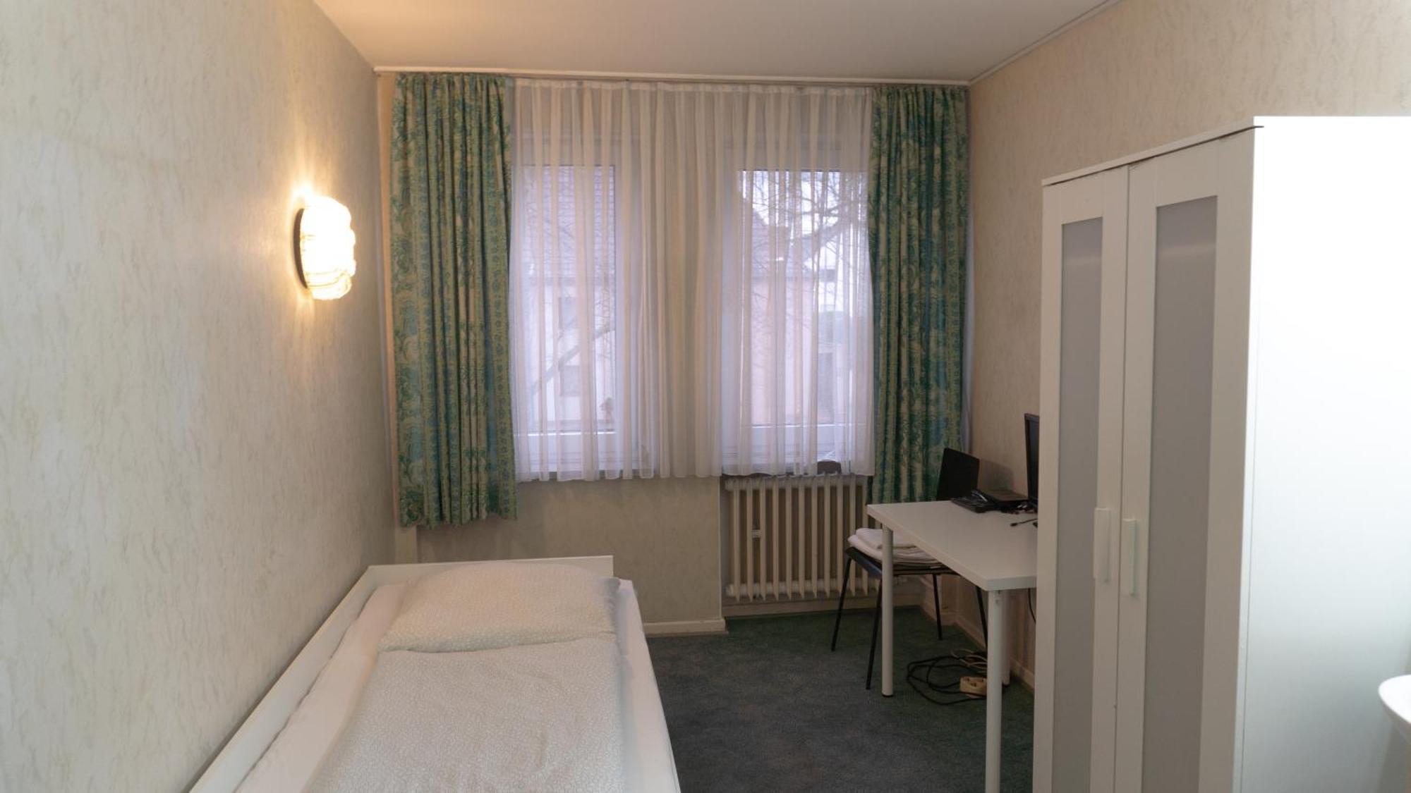 Einzelzimmer mit Gemeinschaftsbad