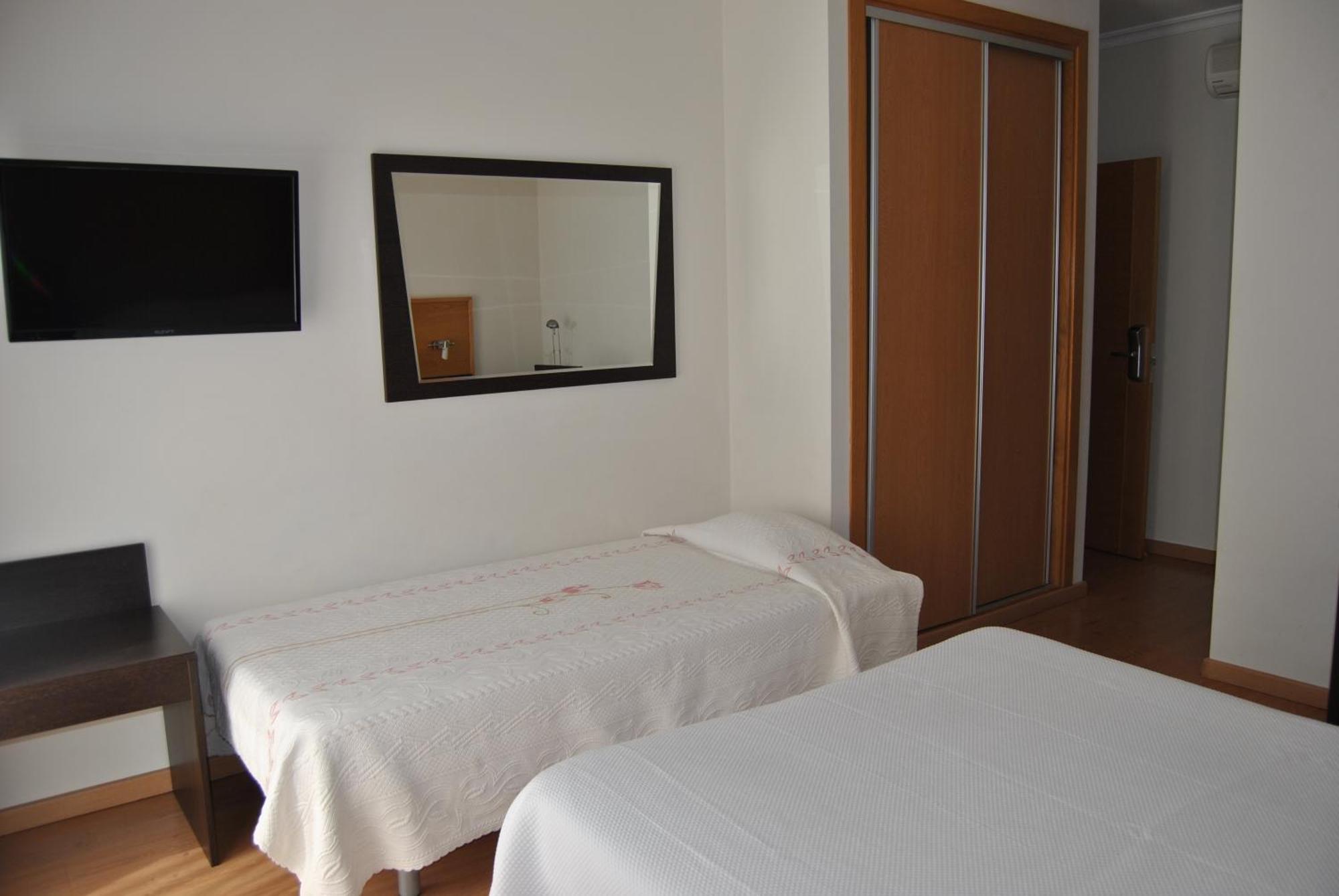 Quarto Duplo com Cama Extra (3 Adultos)