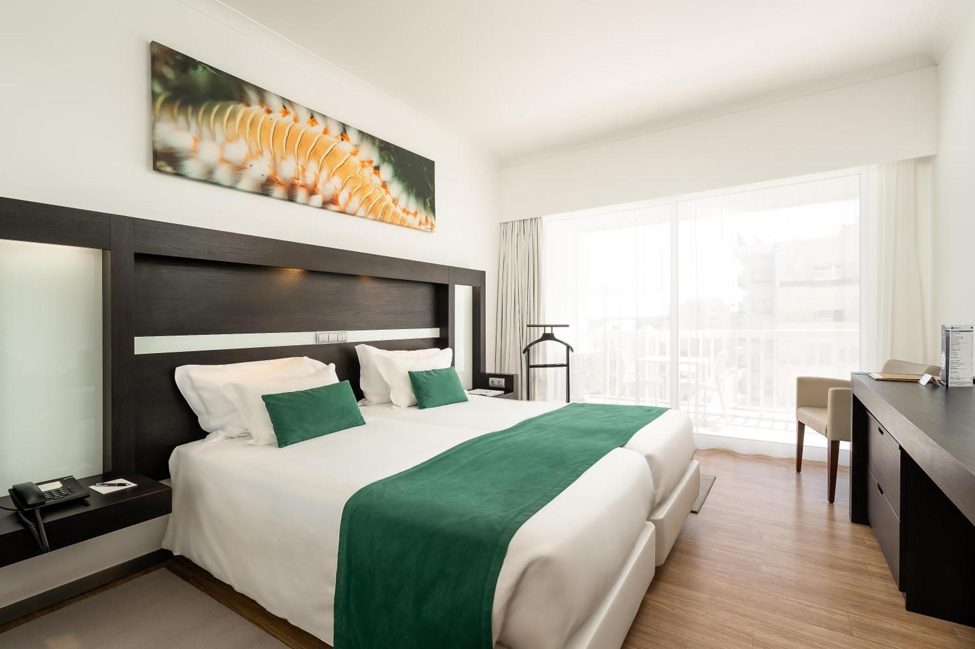 Quarto Superior com Vista Lateral Mar