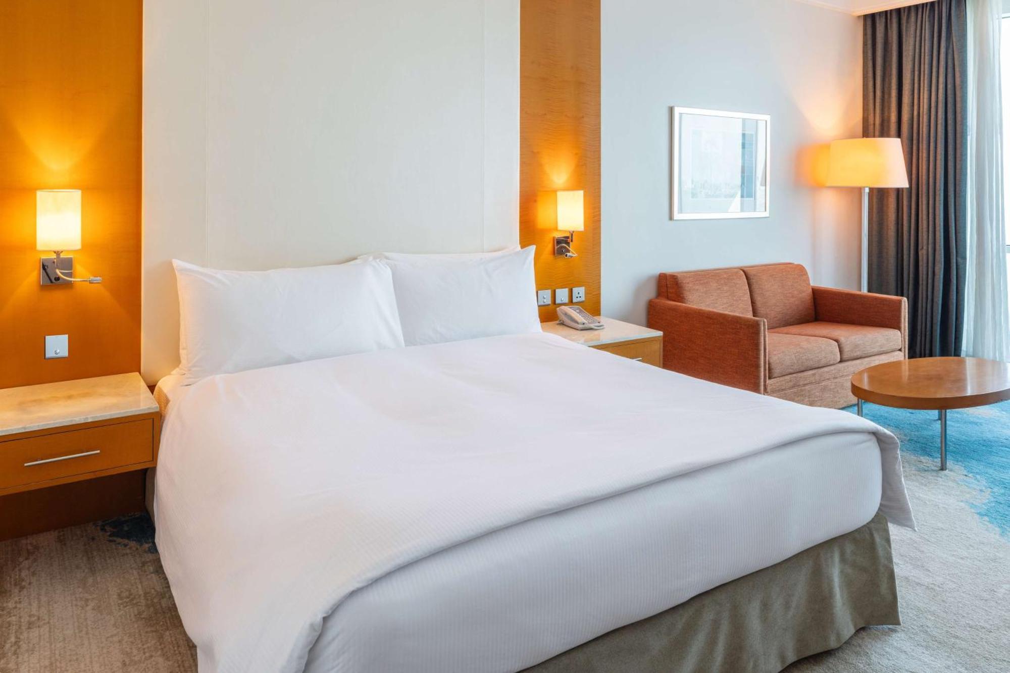 Deluxe Zimmer mit Kingsize-Bett mit Meerblick
