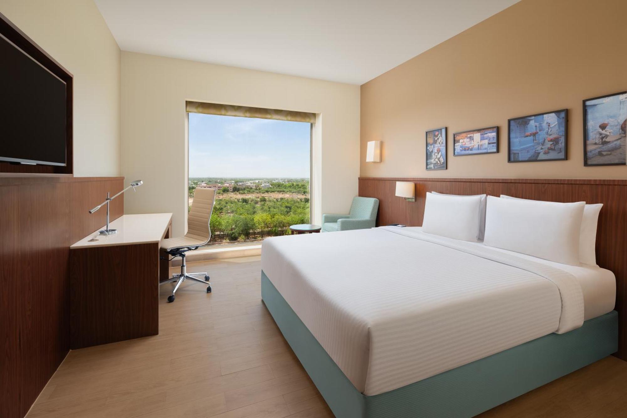 Twin Room: (15% Discount on food & soft beverage at Kava Restaurant, Happy Hours (Buy 1 Get 1) on IMFL beverages at the BAR)
