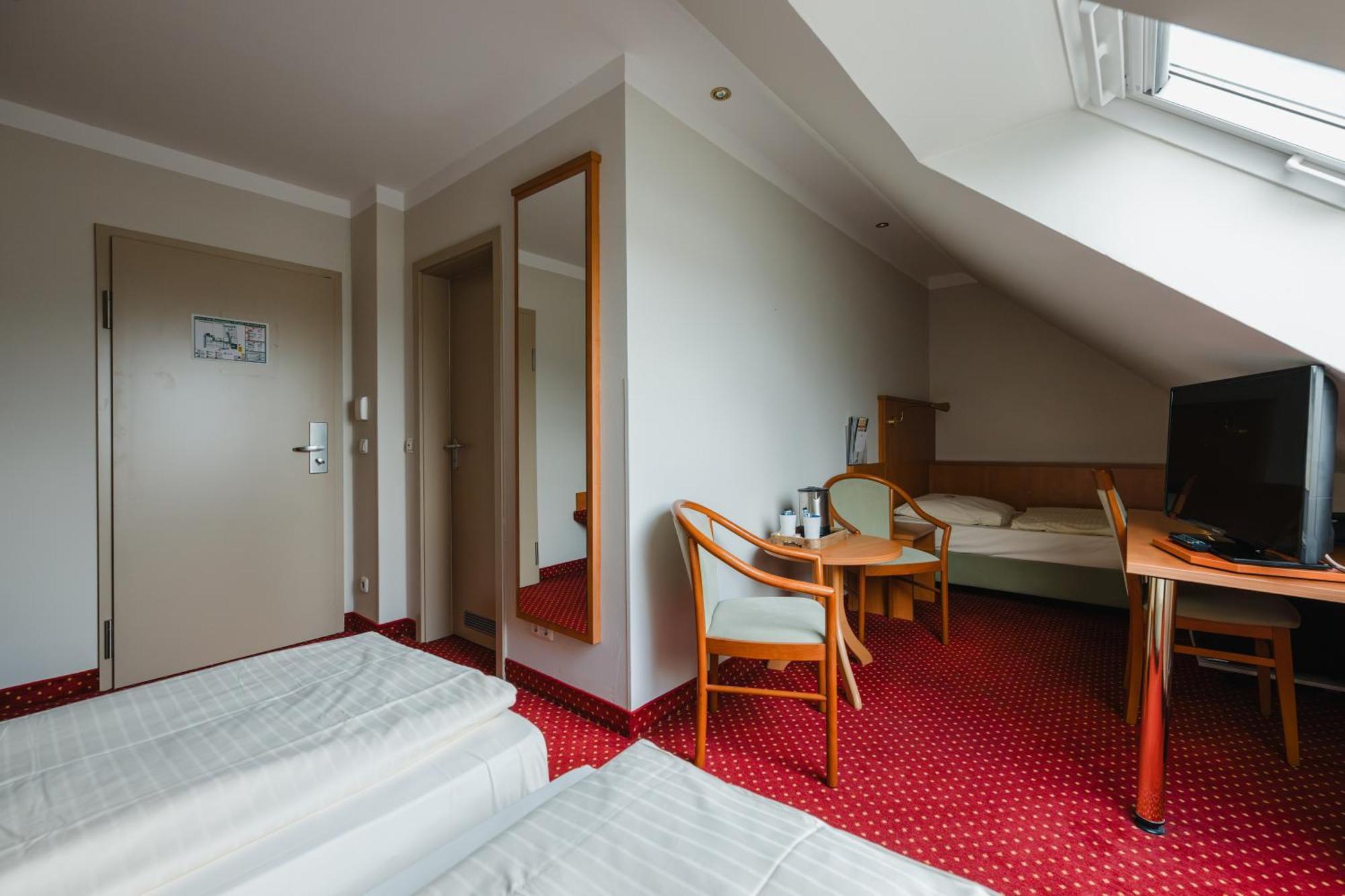 Dreibettzimmer