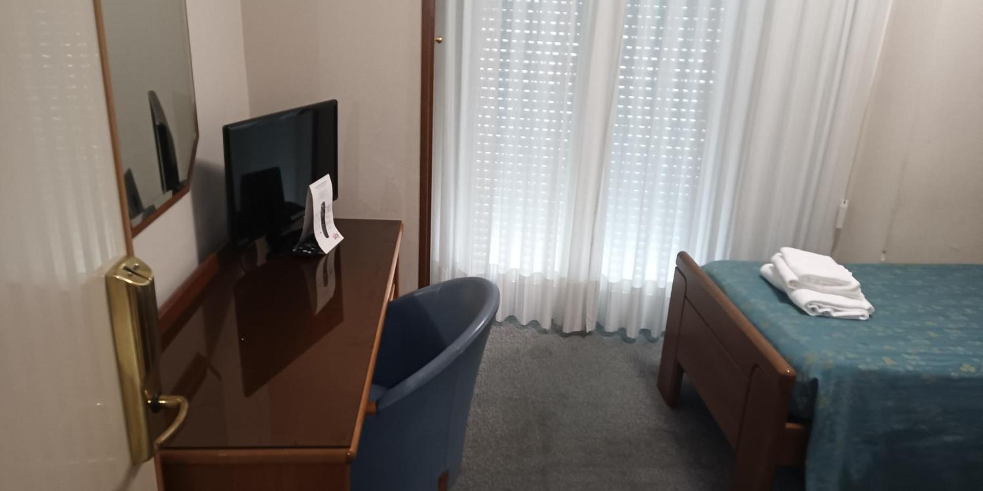 Camera Familiare con Bagno in Comune