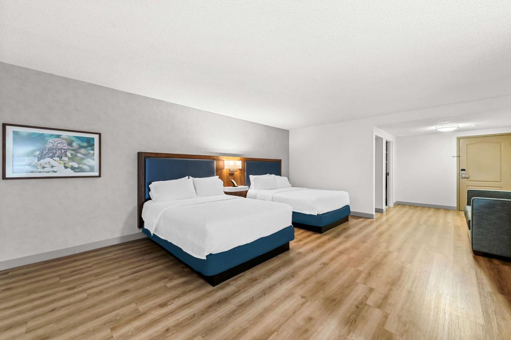 Deluxe Queen Room with Two Queen Beds and Sofa Bed