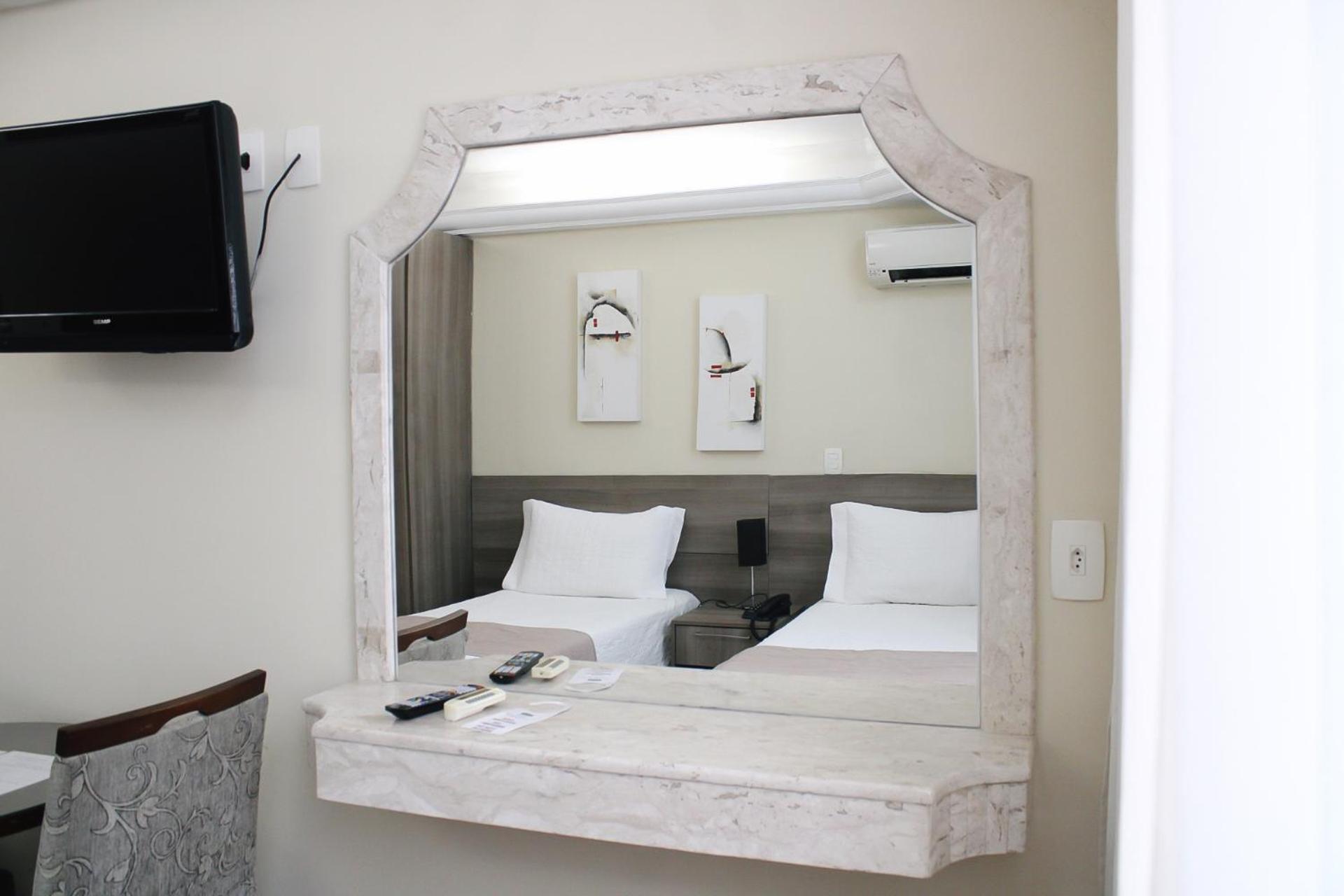 Quarto Duplo