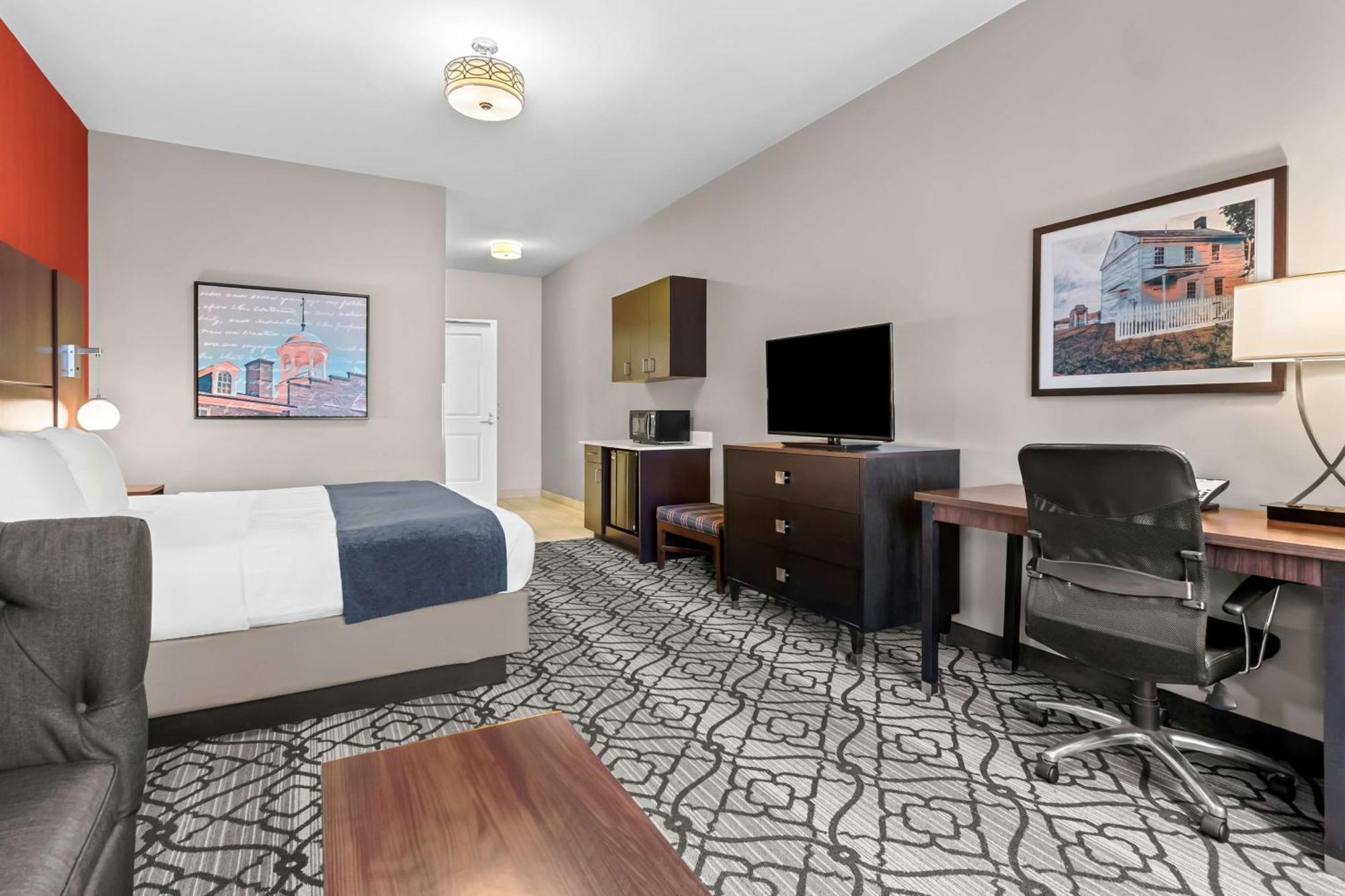 King Room with Mobility Accessible Roll-In Shower and Sofa Bed