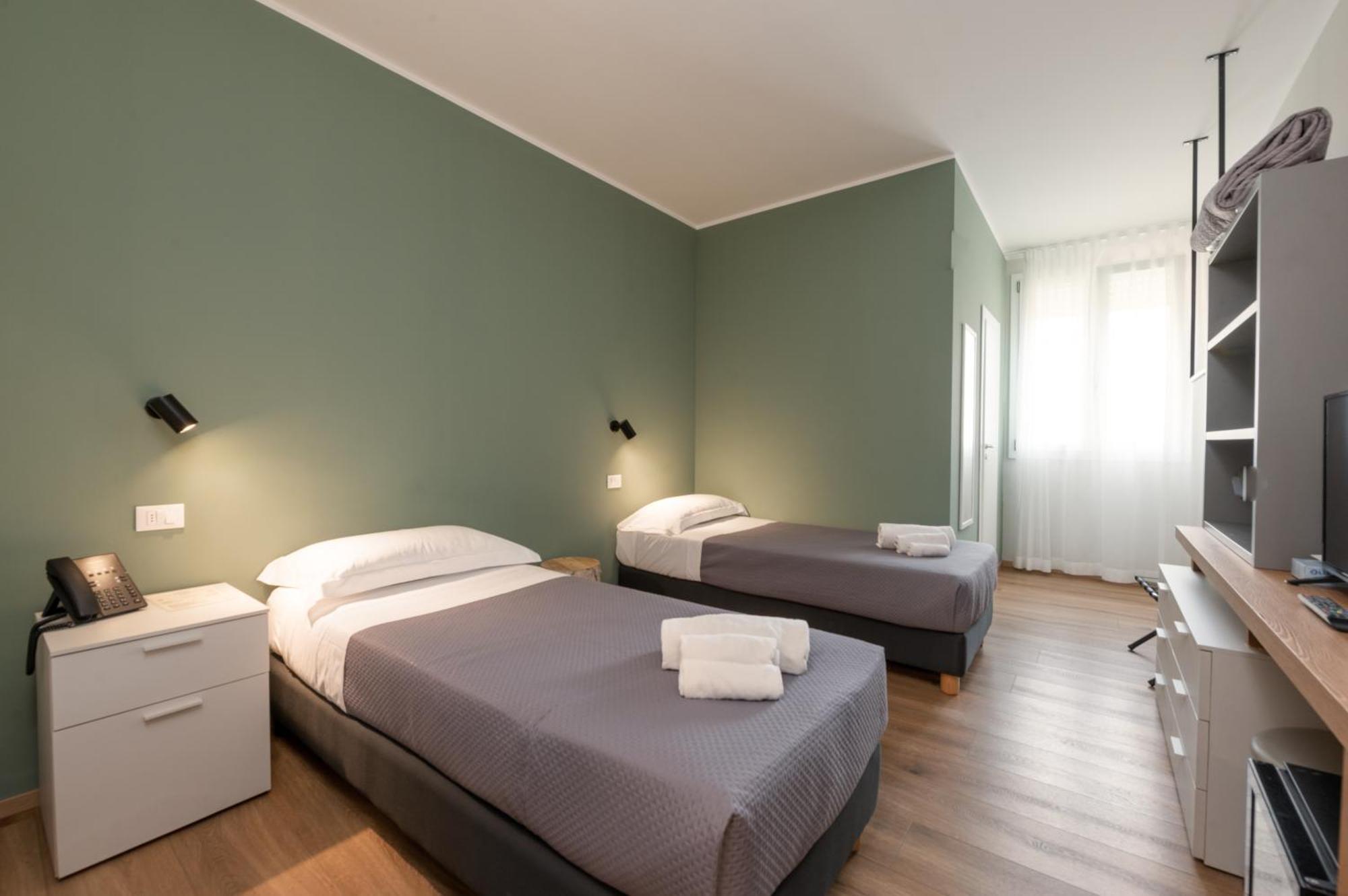 Doppel- oder Zweibettzimmer