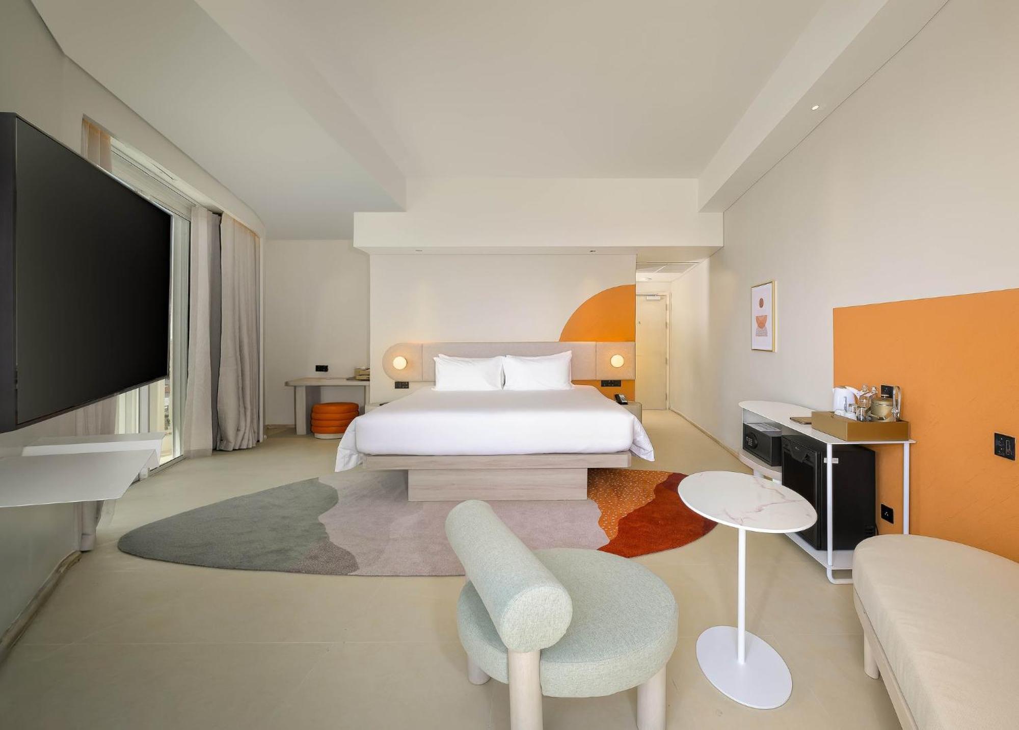 Deluxe Spa Suite met uitzicht op de oceaan en kingsize bed