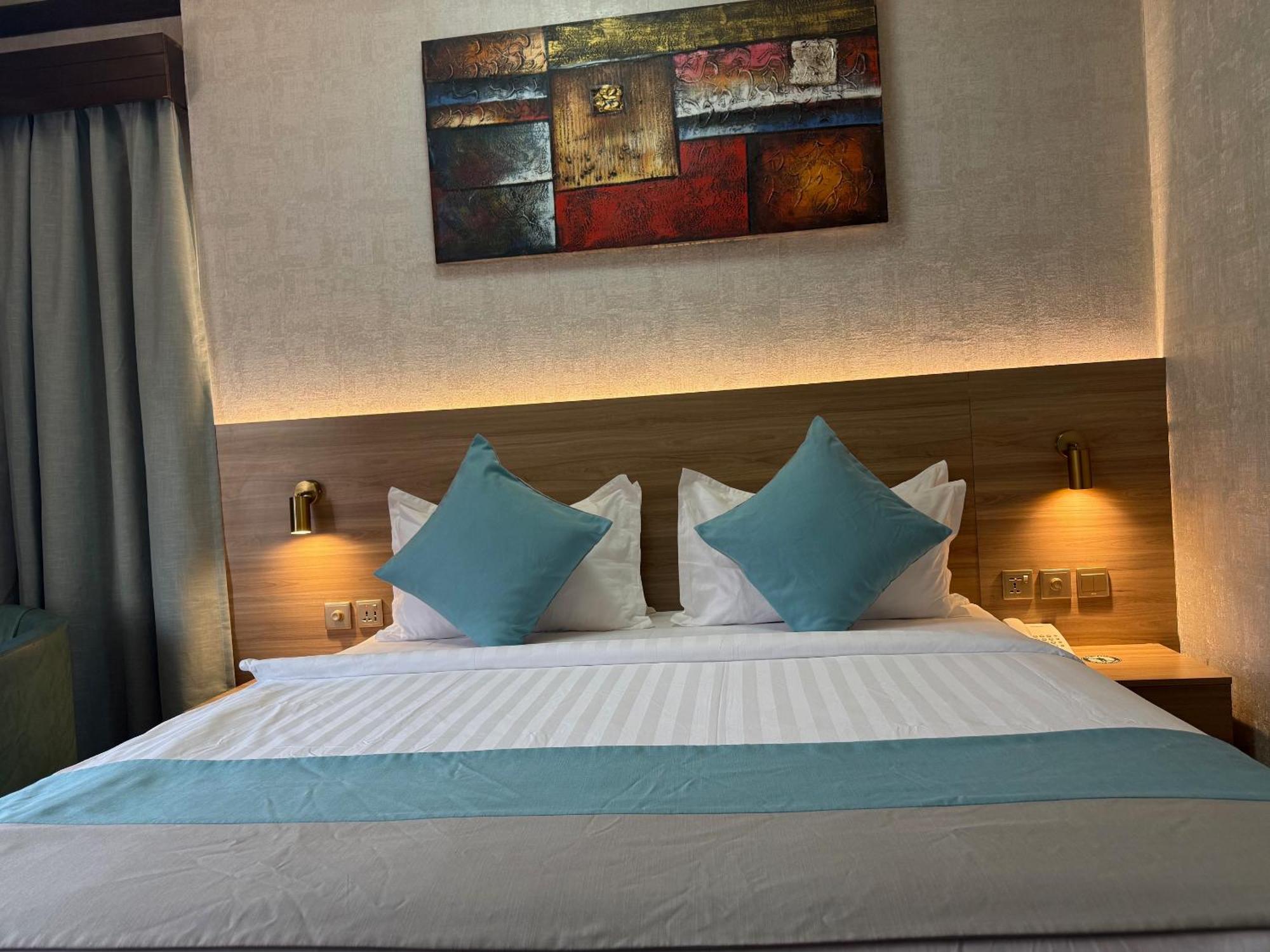 Deluxe Zimmer mit Kingsize-Bett