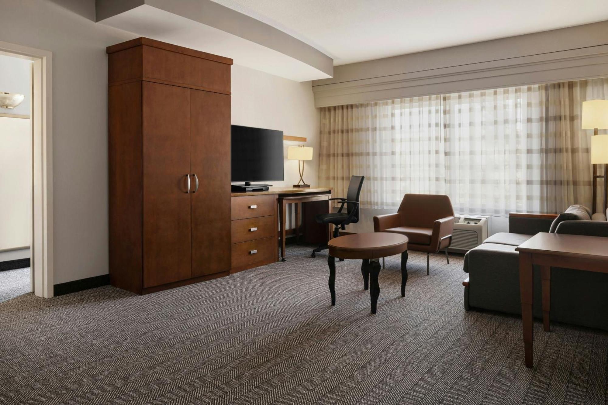 One-Bedroom King Suite with Roll-In Shower and Sofa Bed - Mobility Access/Hearing Accessible