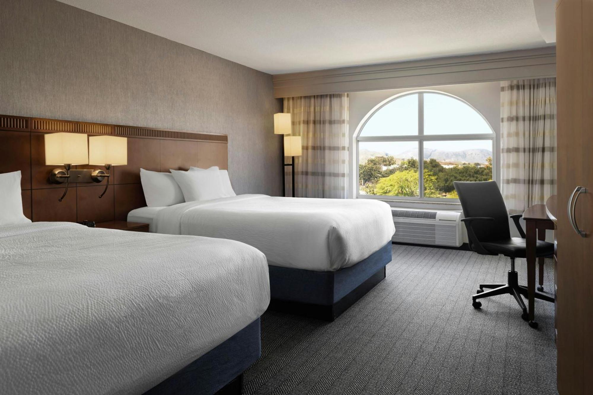 Queen Room with Two Queen Beds and Sofa Bed