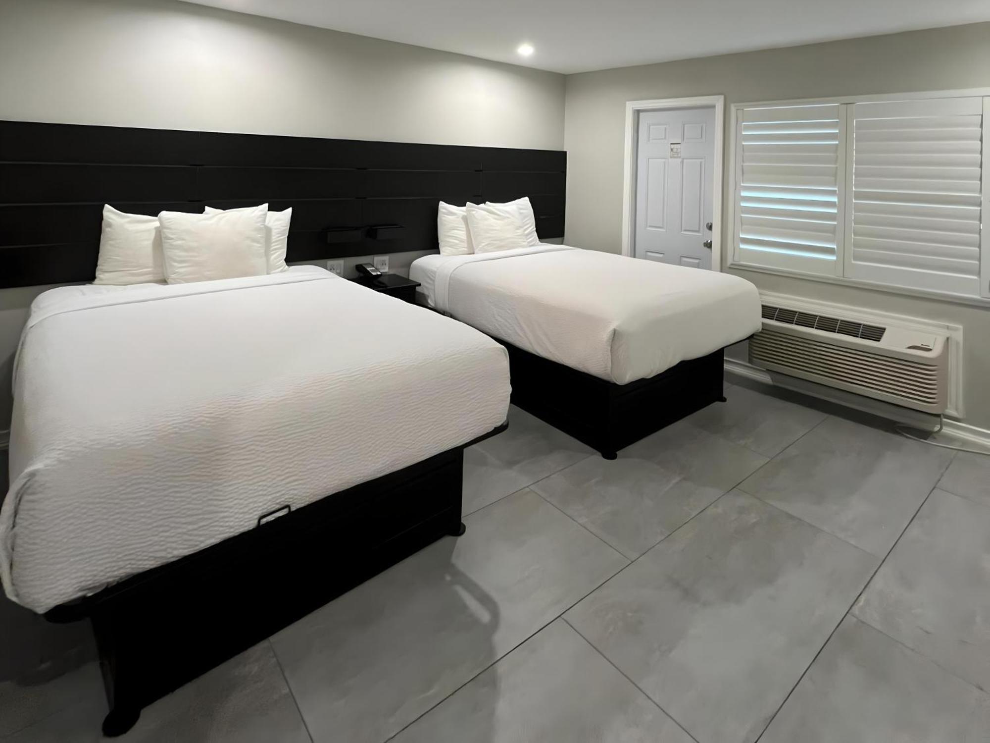 Quarto Queen com 2 Camas Queen-size - Aceita Animais de Estimação