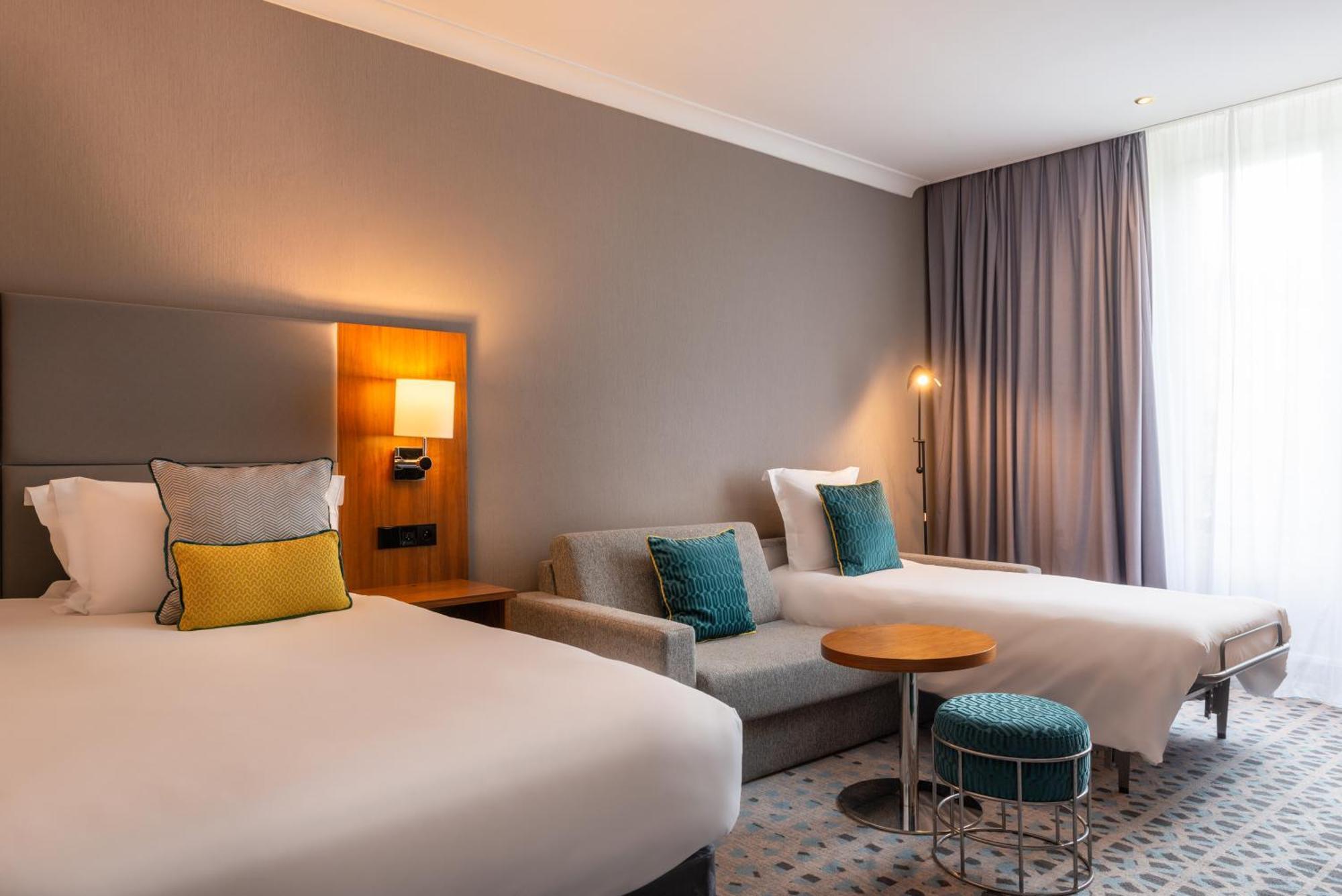Quarto King Premium com Sofá-cama