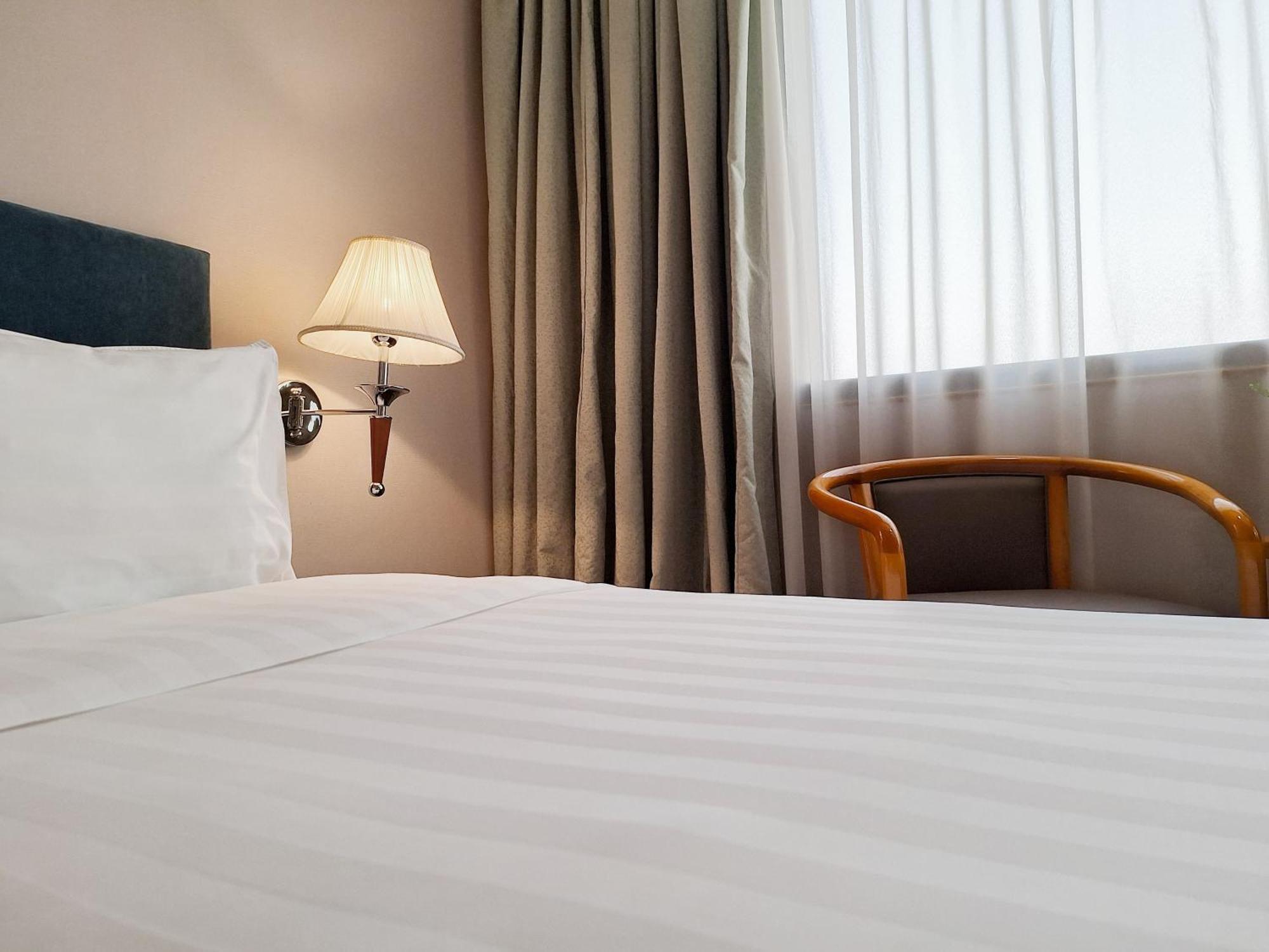 Deluxe Tweepersoonskamer met 1 of 2 Bedden