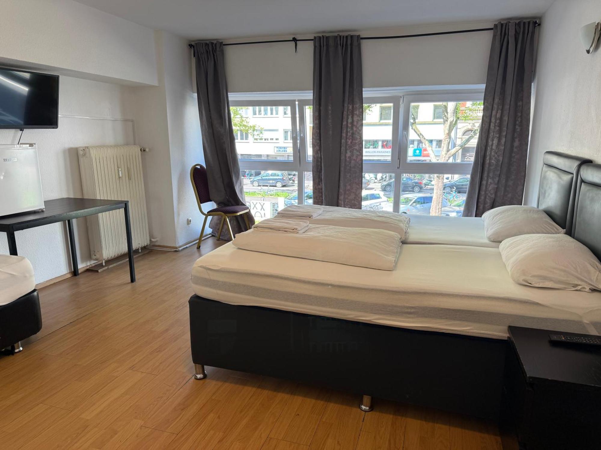 Camera Tripla Comfort con Bagno in Comune