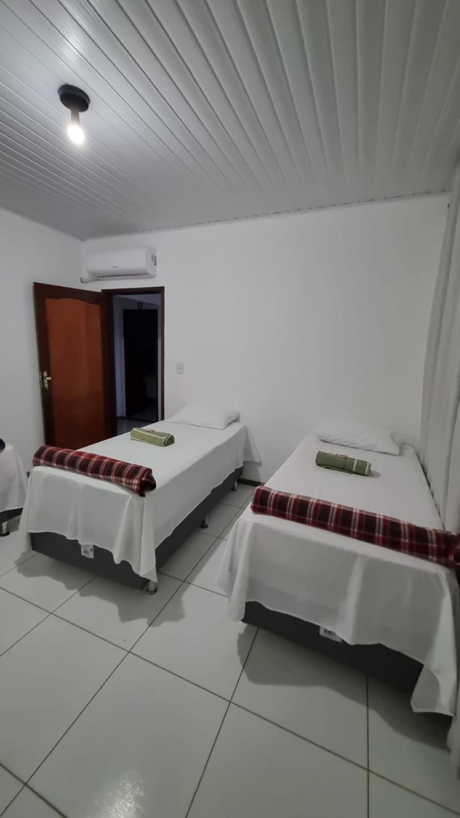 Quarto Triplo com Banheiro Privativo