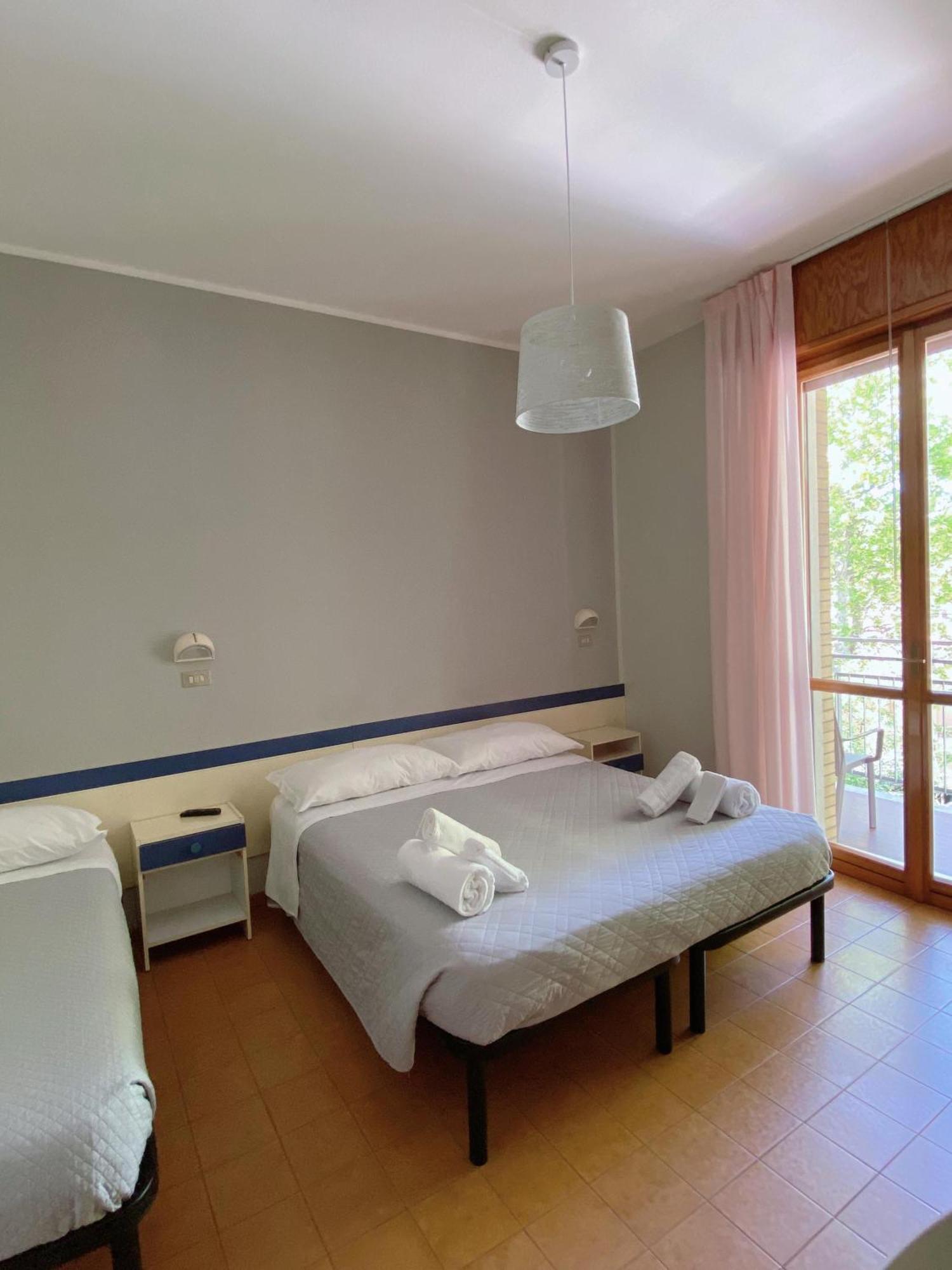 Camera Tripla con Balcone
