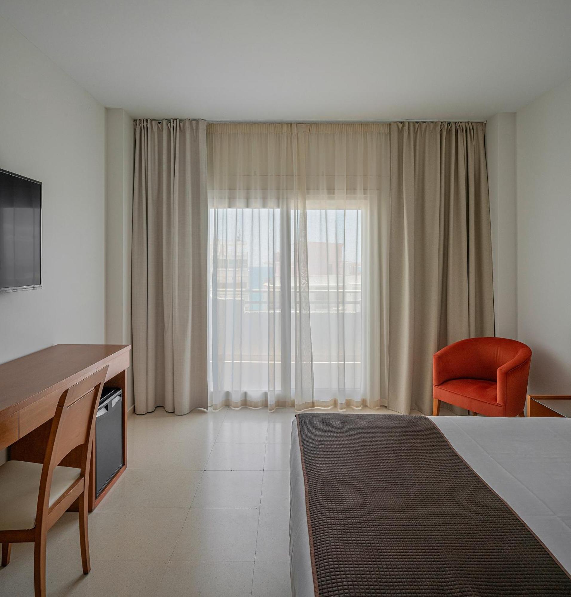 Habitación Doble con cama supletoria (2 adultos + 1 niño)