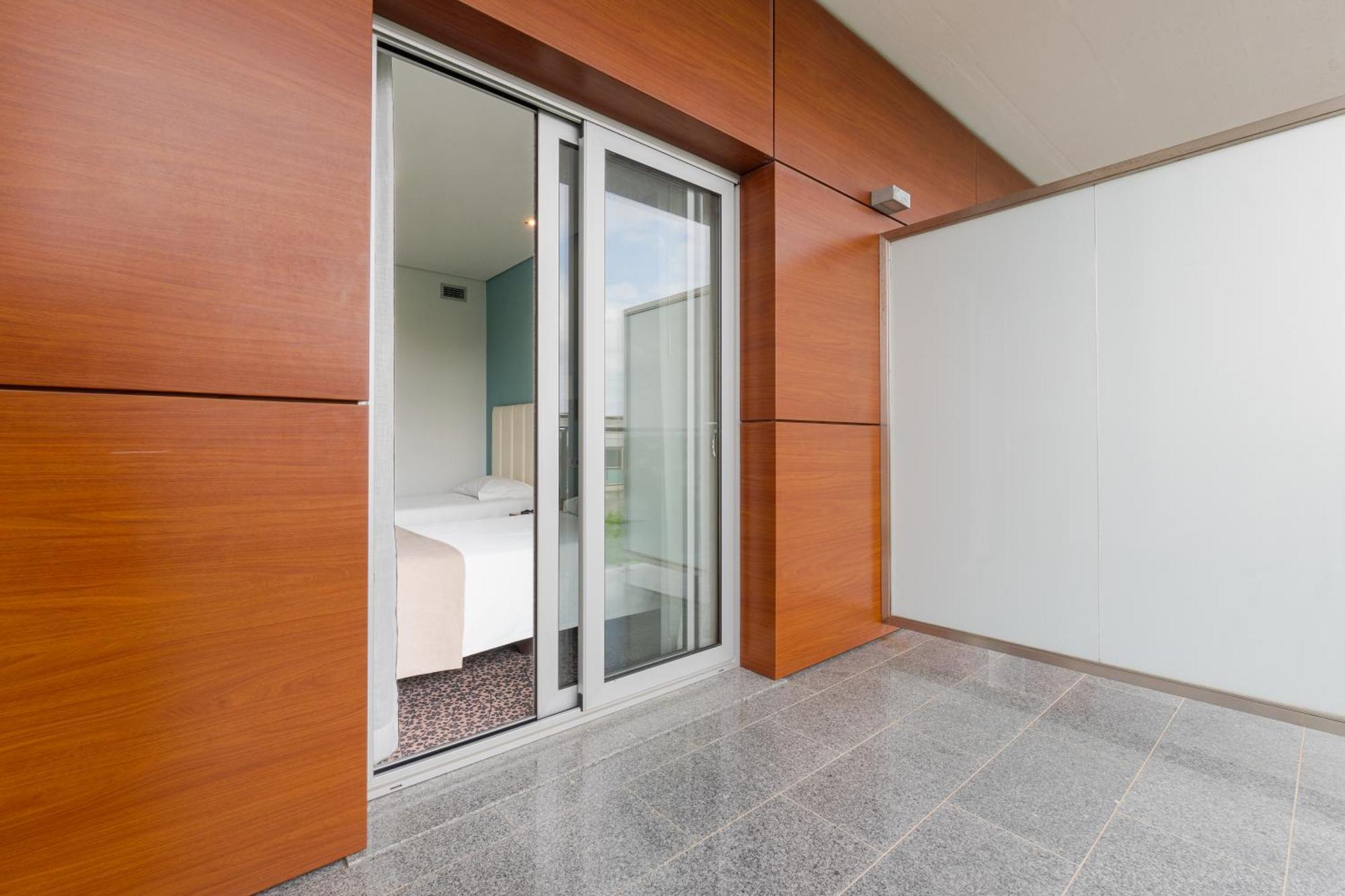 Quarto Twin com Varanda