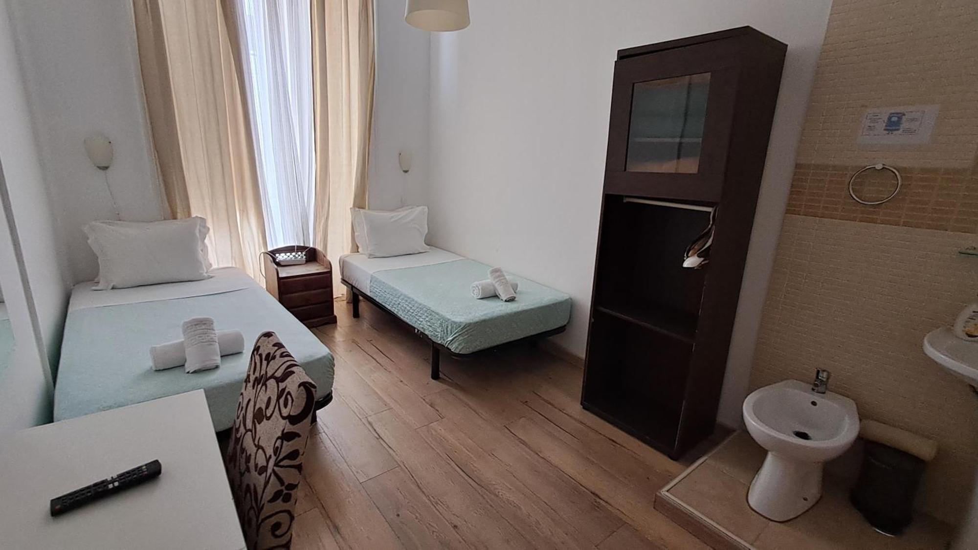 Quarto Duplo ou Twin com Casa de Banho Partilhada