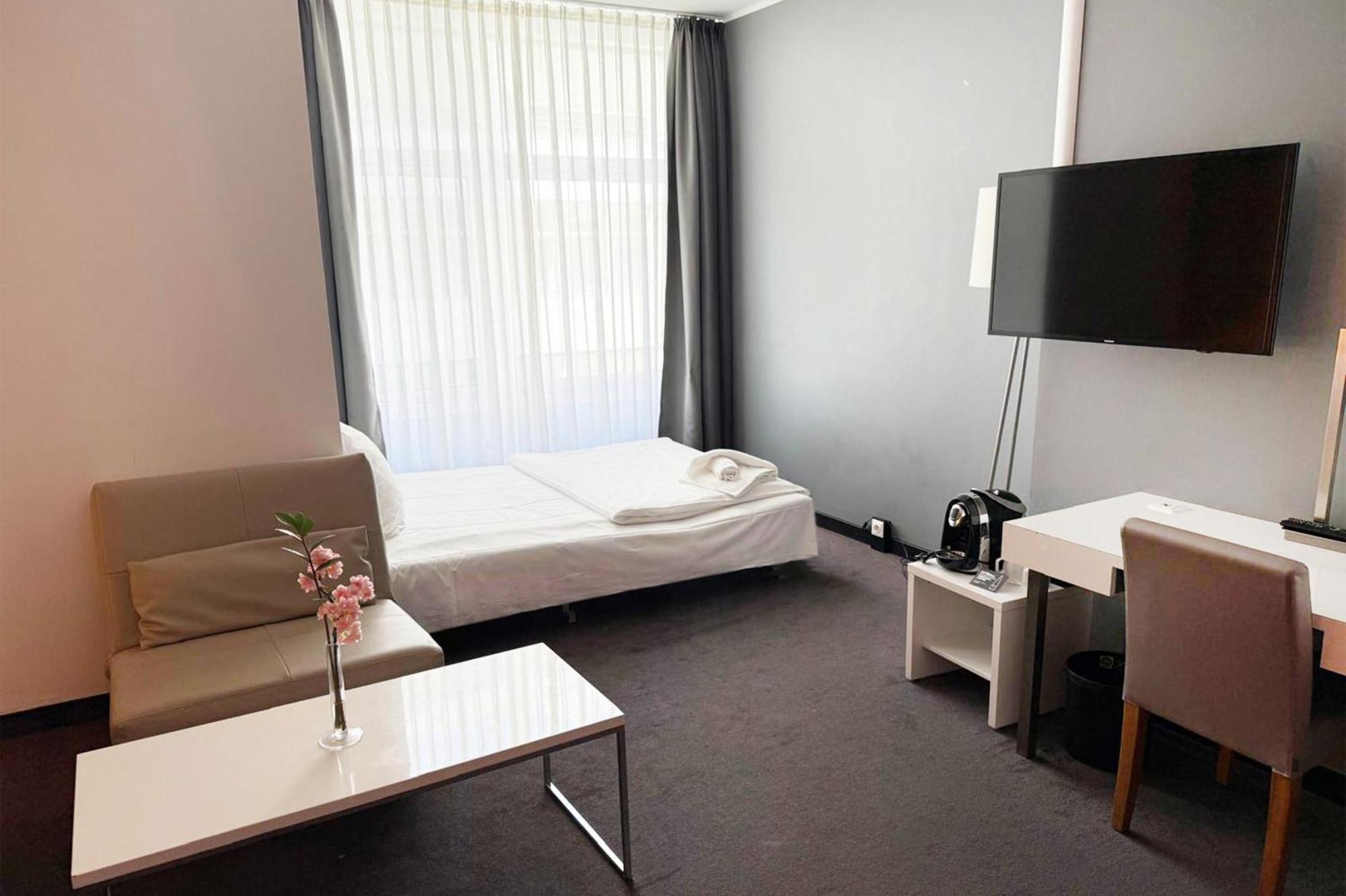 Camera Familiare Premium con Letto King-Size e Divano Letto
