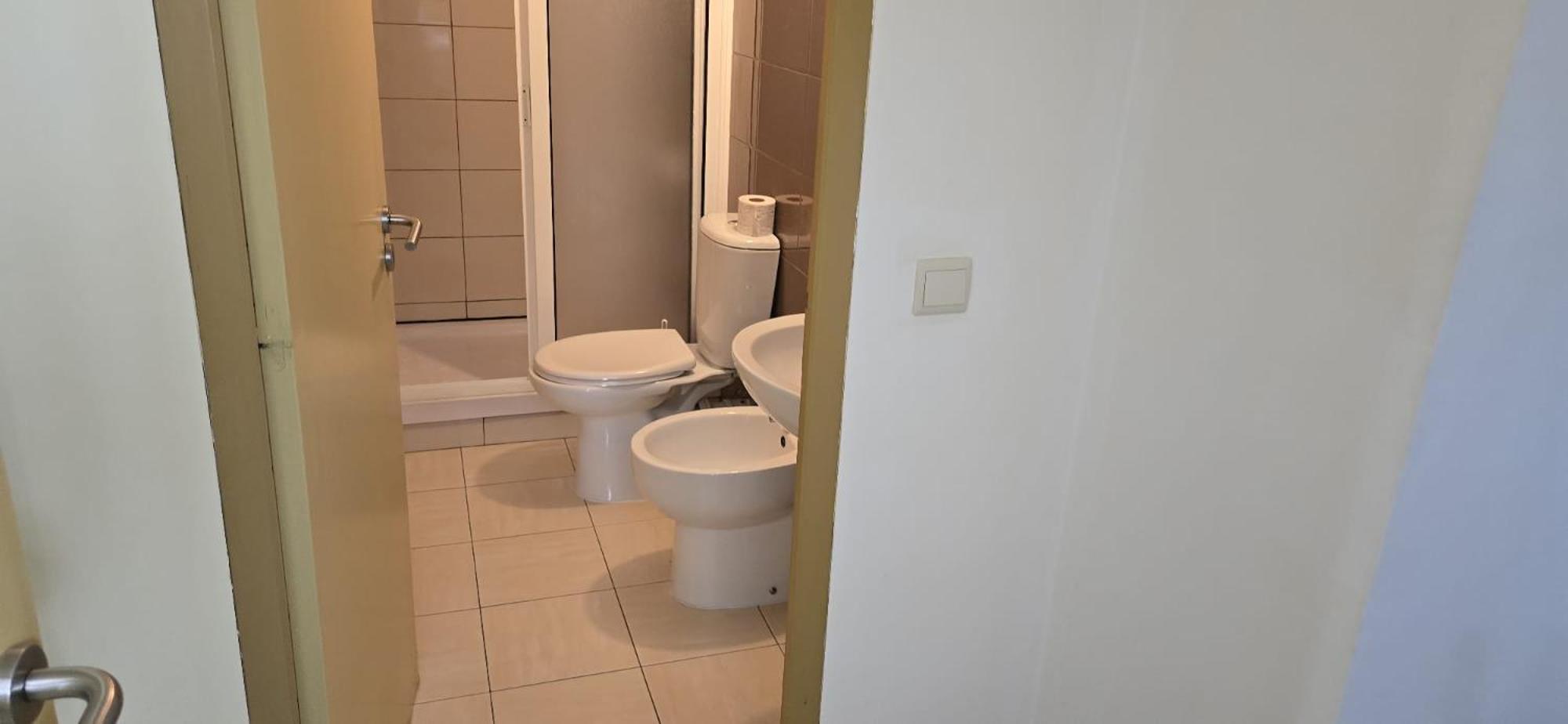Quarto Triplo com Casa de Banho Privativa