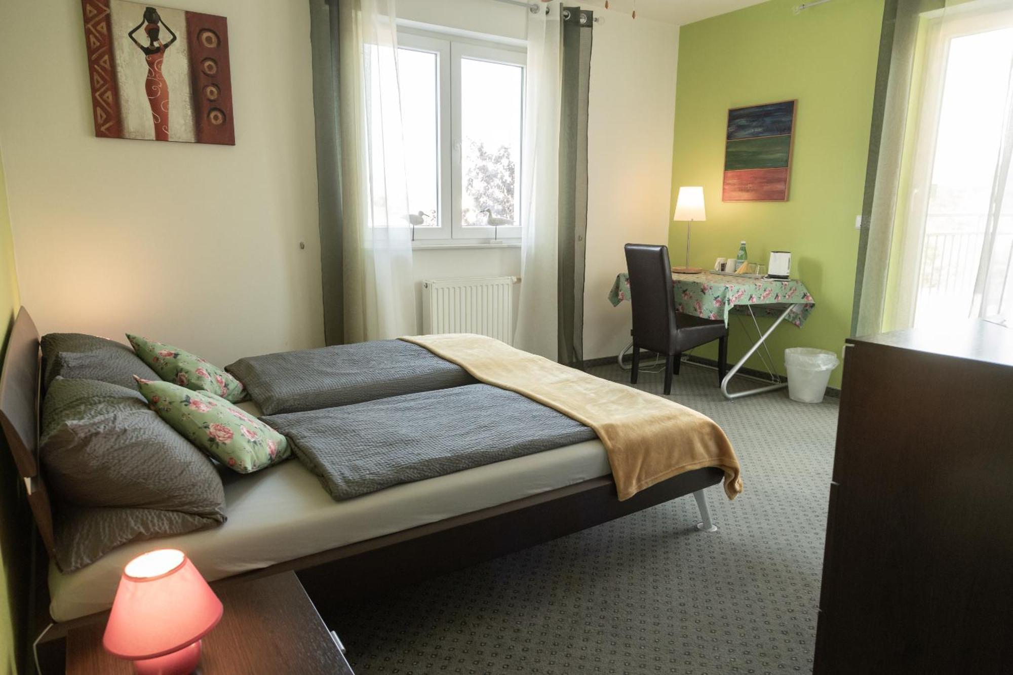 Doppelzimmer mit Balkon