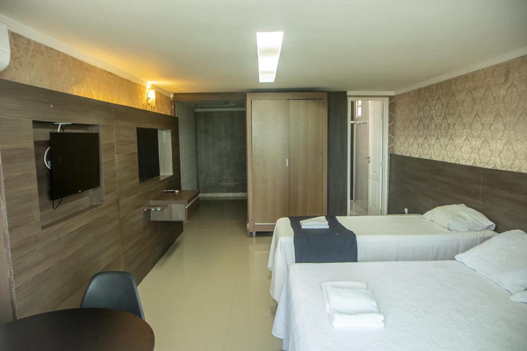 Quarto Triplo com Vista do Mar
