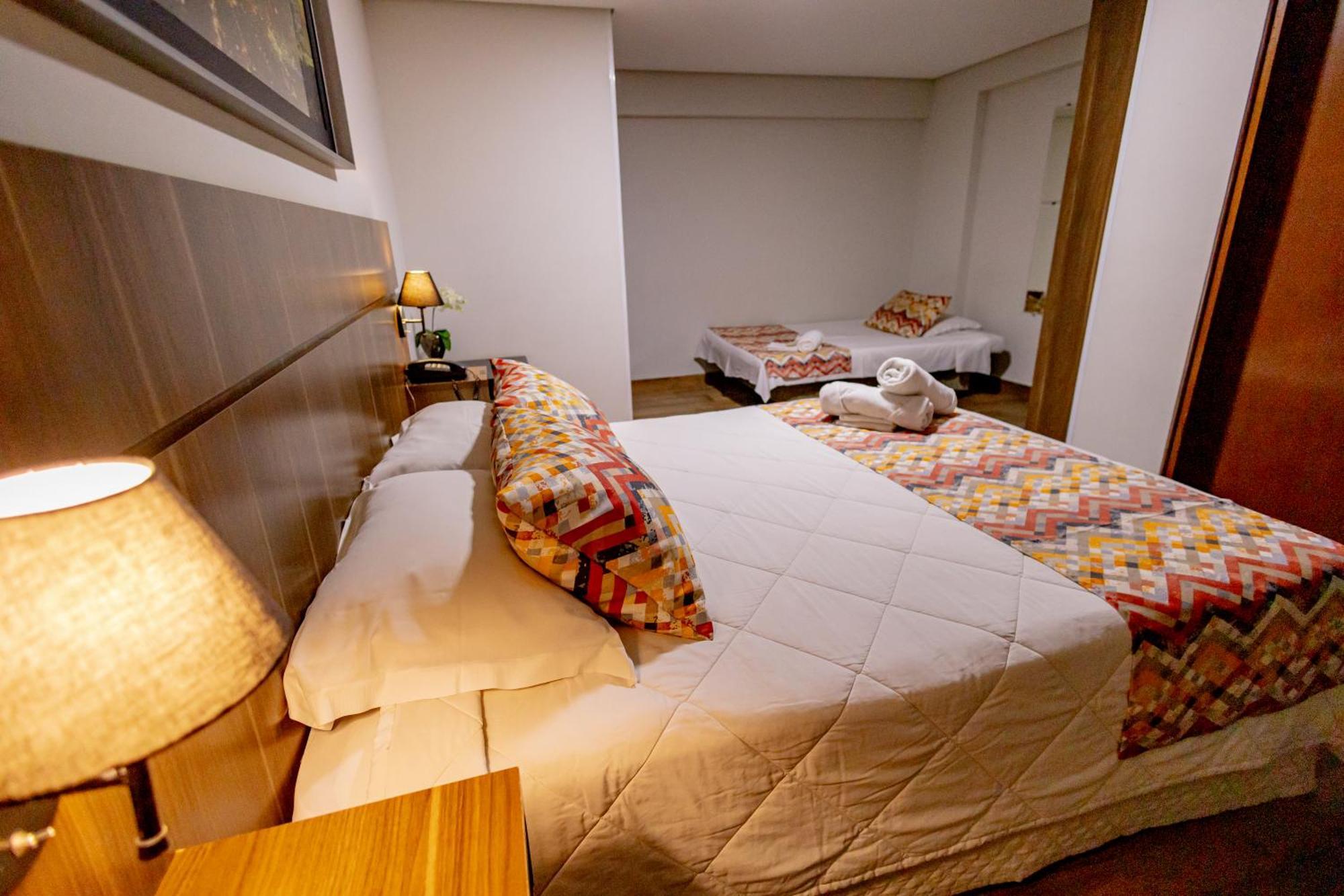 Quarto Duplo Deluxe (2 Adultos + 1 Criança)