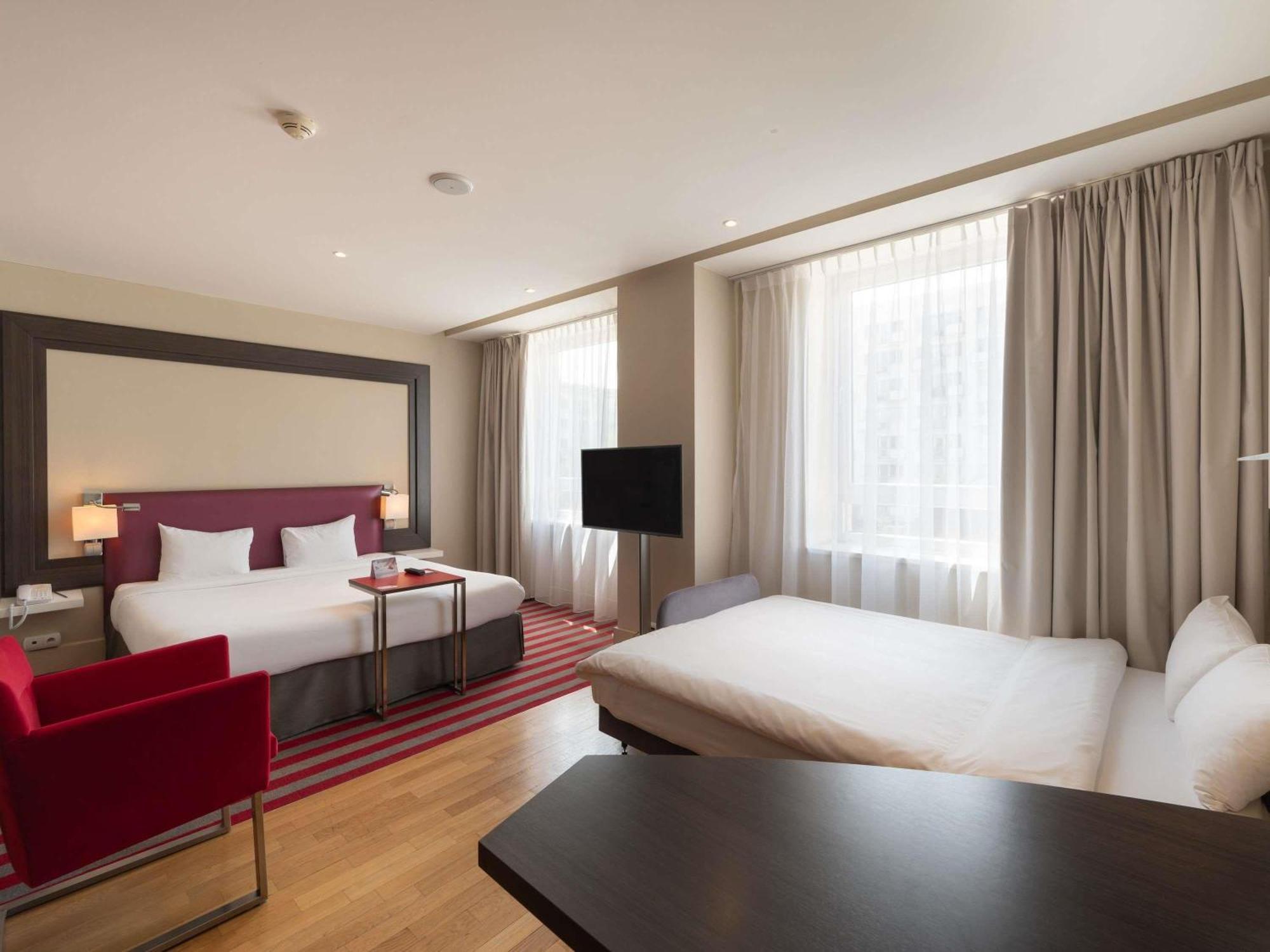 Superior Kamer met 1 kingsize bed en een bank