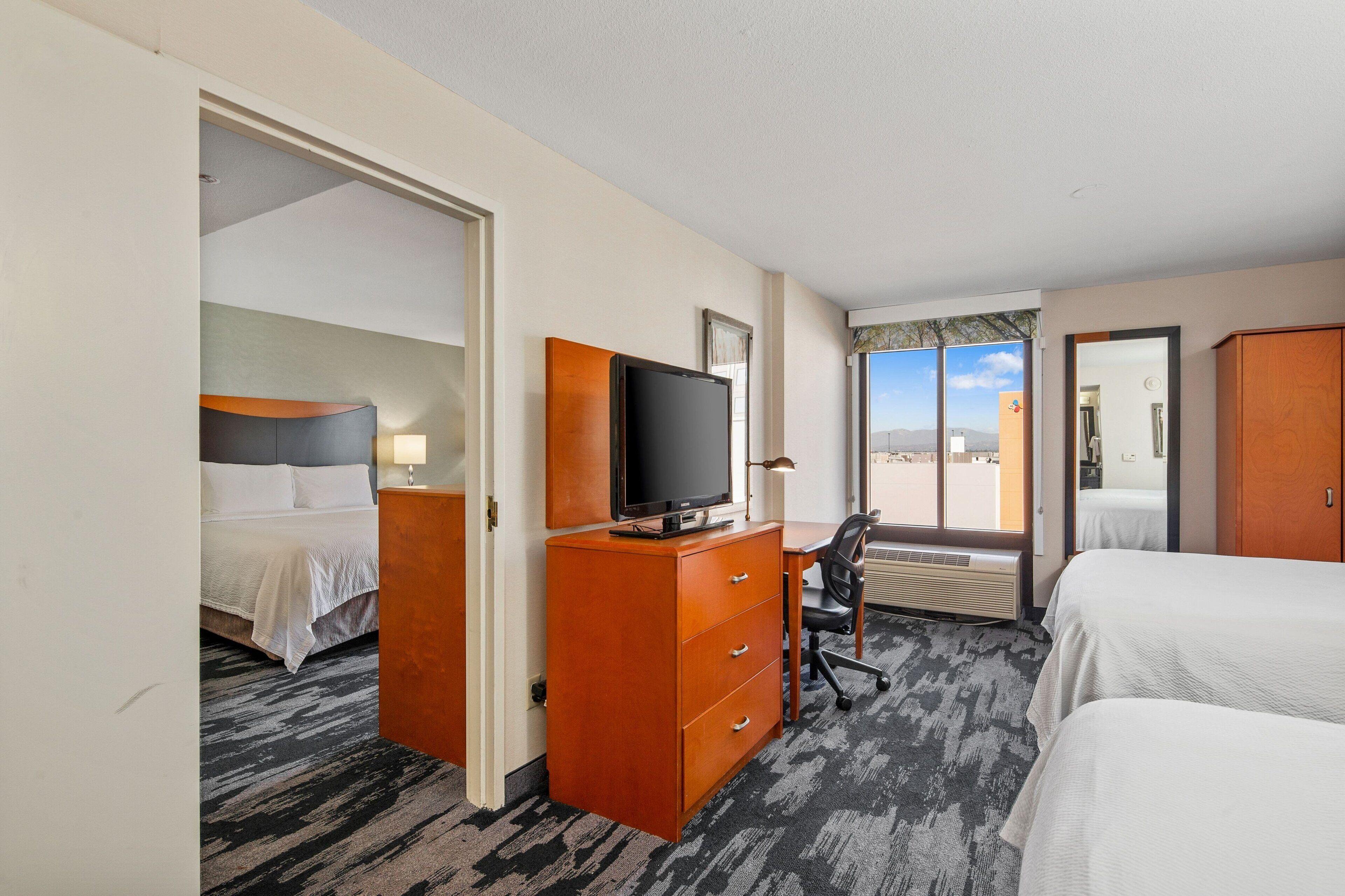 Two-Bedroom Suite with One King Bed and Two Queen Beds