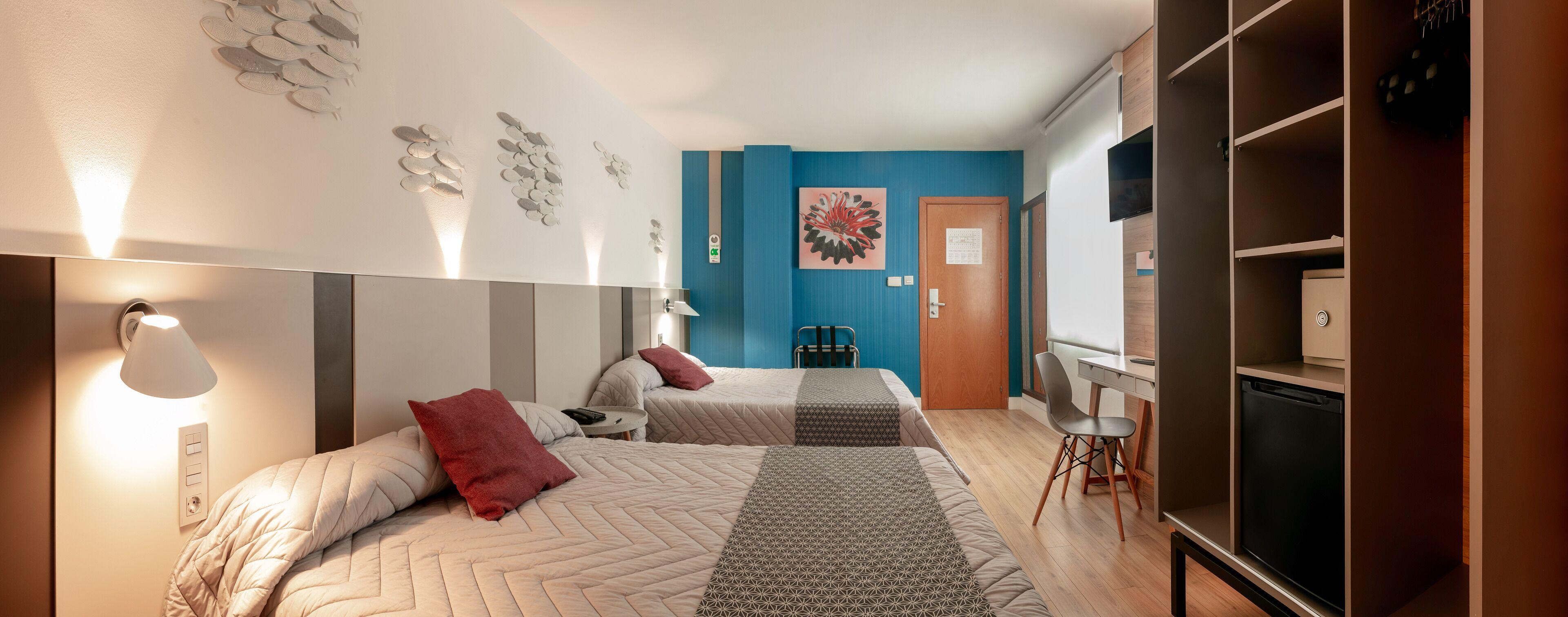 Quarto Duplo Básico (1 Adulto + 1 Criança)