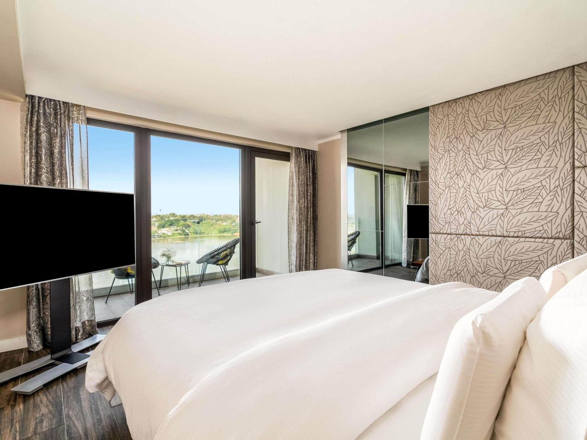 Chambre d'Angle Deluxe avec Lit King-Size et Balcon - Vue sur Lagune